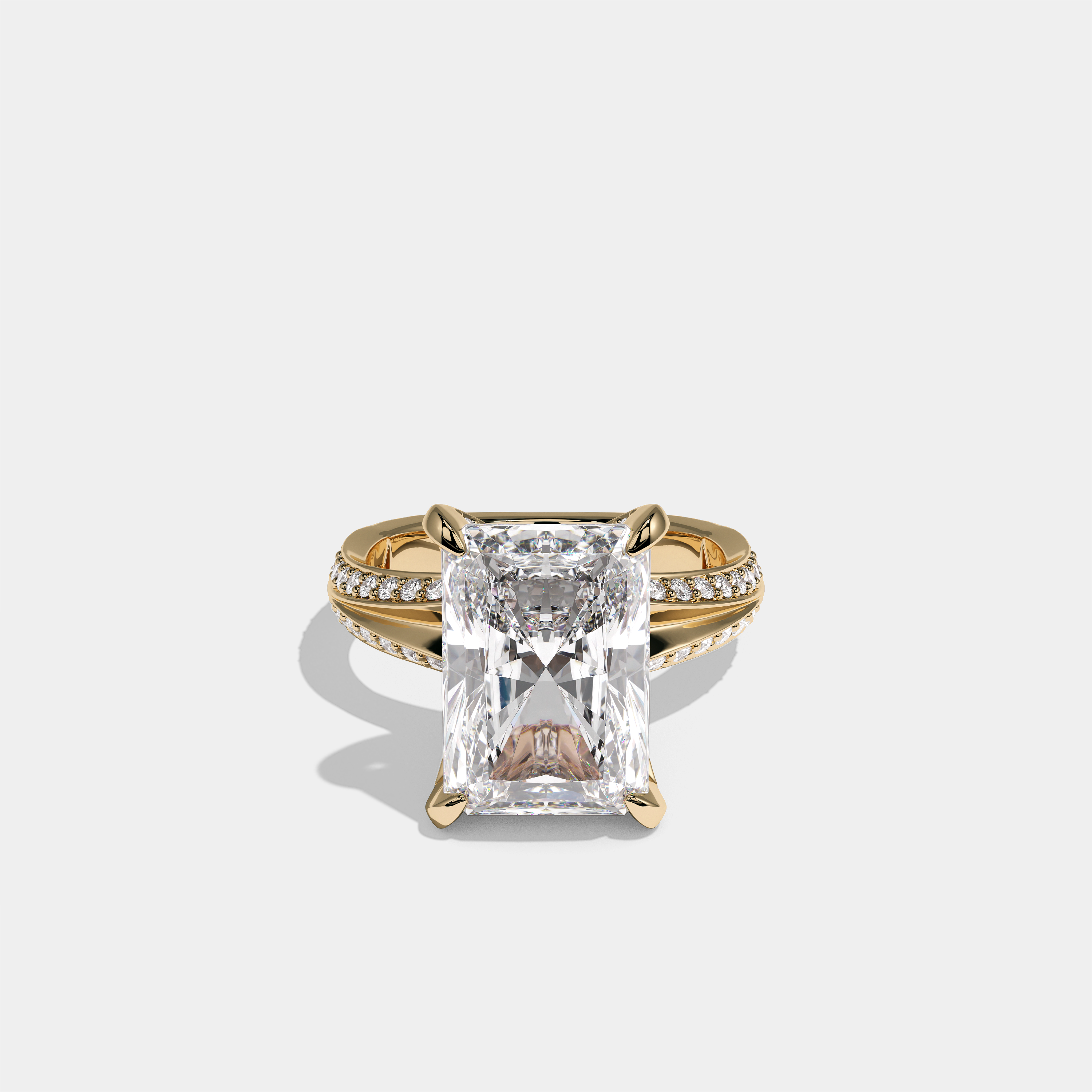 Gila Eclat Highbury diamond radiant halo engagement ring in 18K yellow gold by Kurbãni Durjini, front view