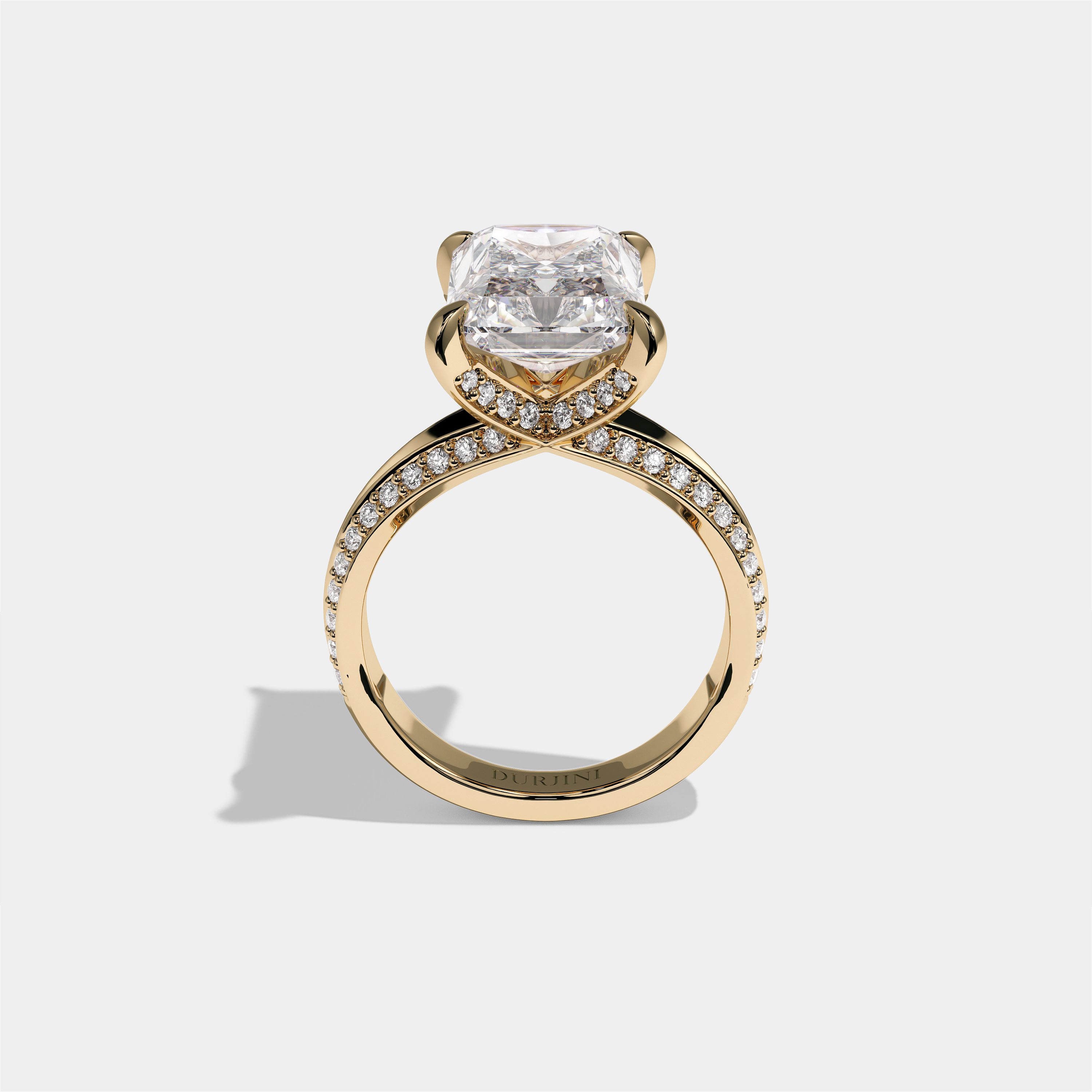 Gila Eclat Highbury diamond radiant halo engagement ring in 18K yellow gold by Kurbãni Durjini, full view