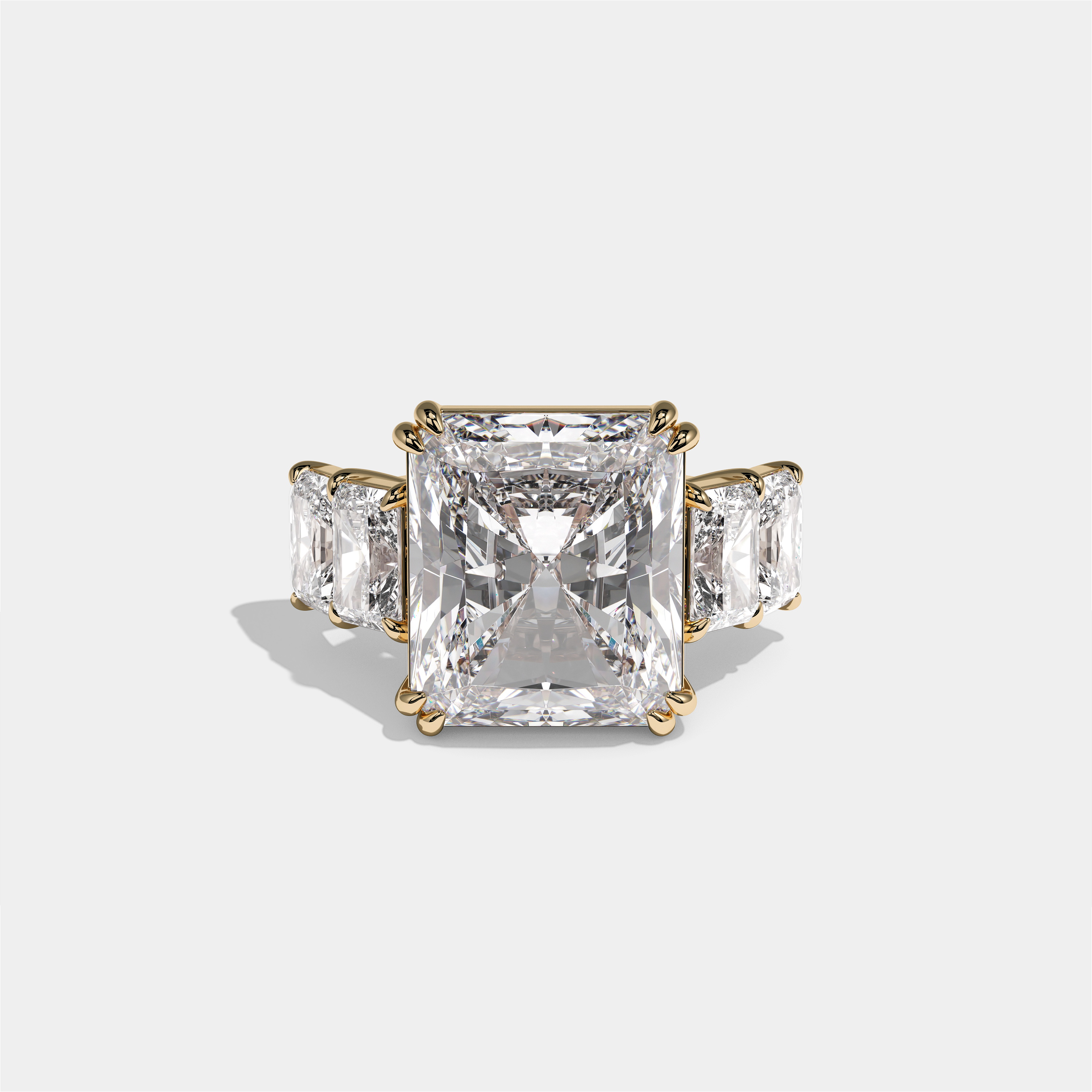 Hila Highgrove diamond radiant halo engagement ring in 18K yellow gold by Kurbãni Durjini, front view