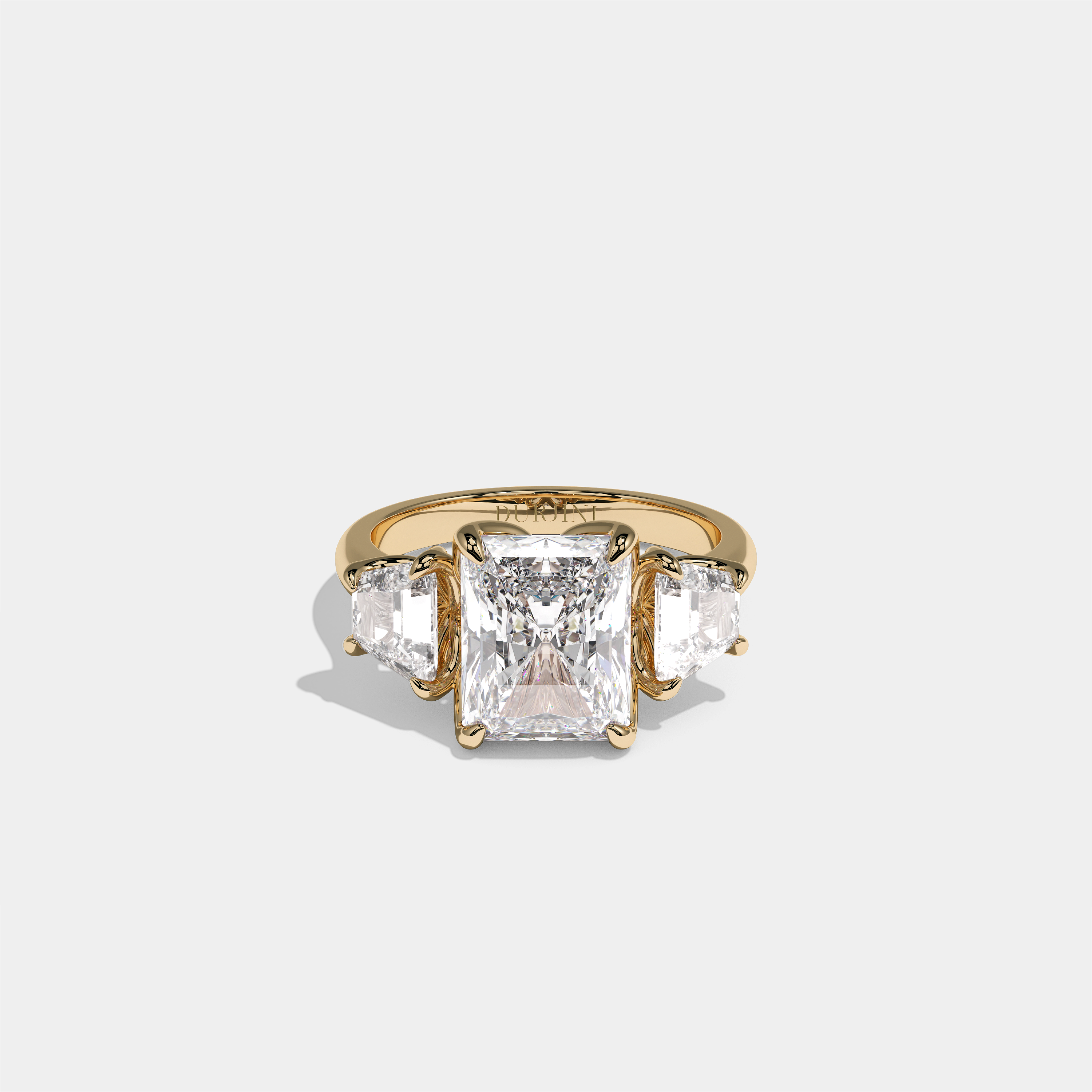 Yehudit Ashwell diamond radiant halo engagement ring in 18K yellow gold by Kurbãni Durjini, front view