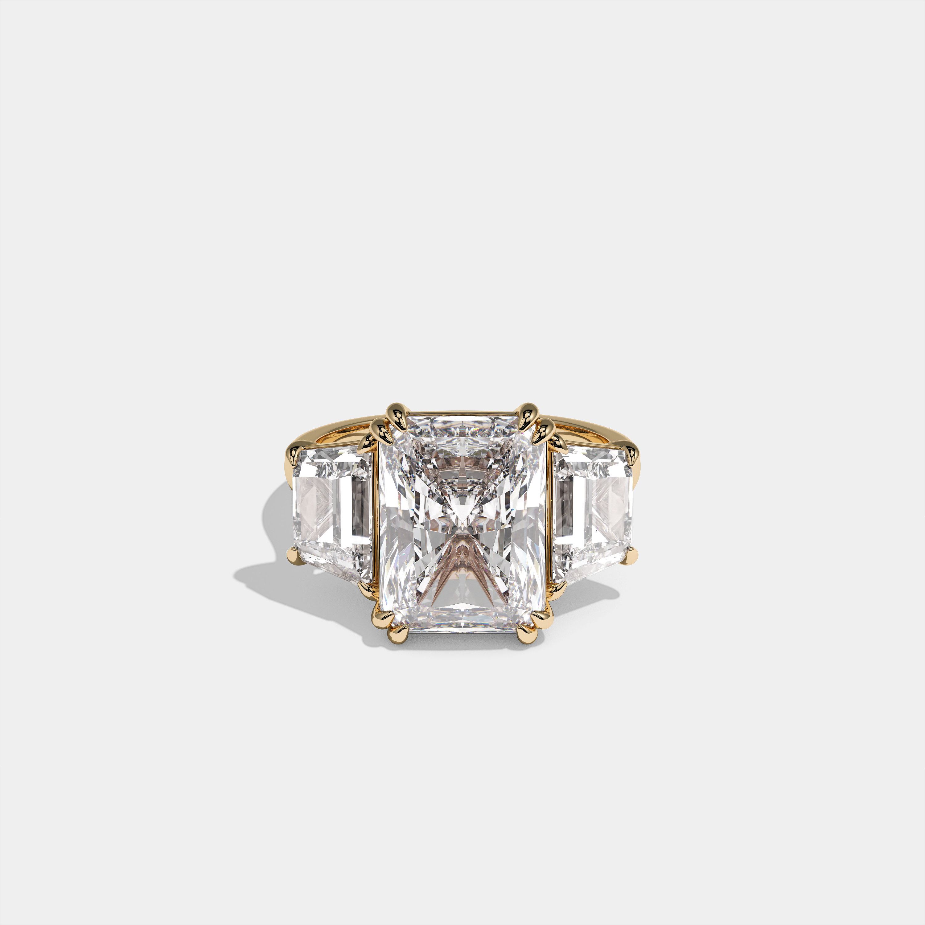 Nessa Beaumont diamond radiant halo engagement ring in 18K yellow gold by Kurbãni Durjini, front view