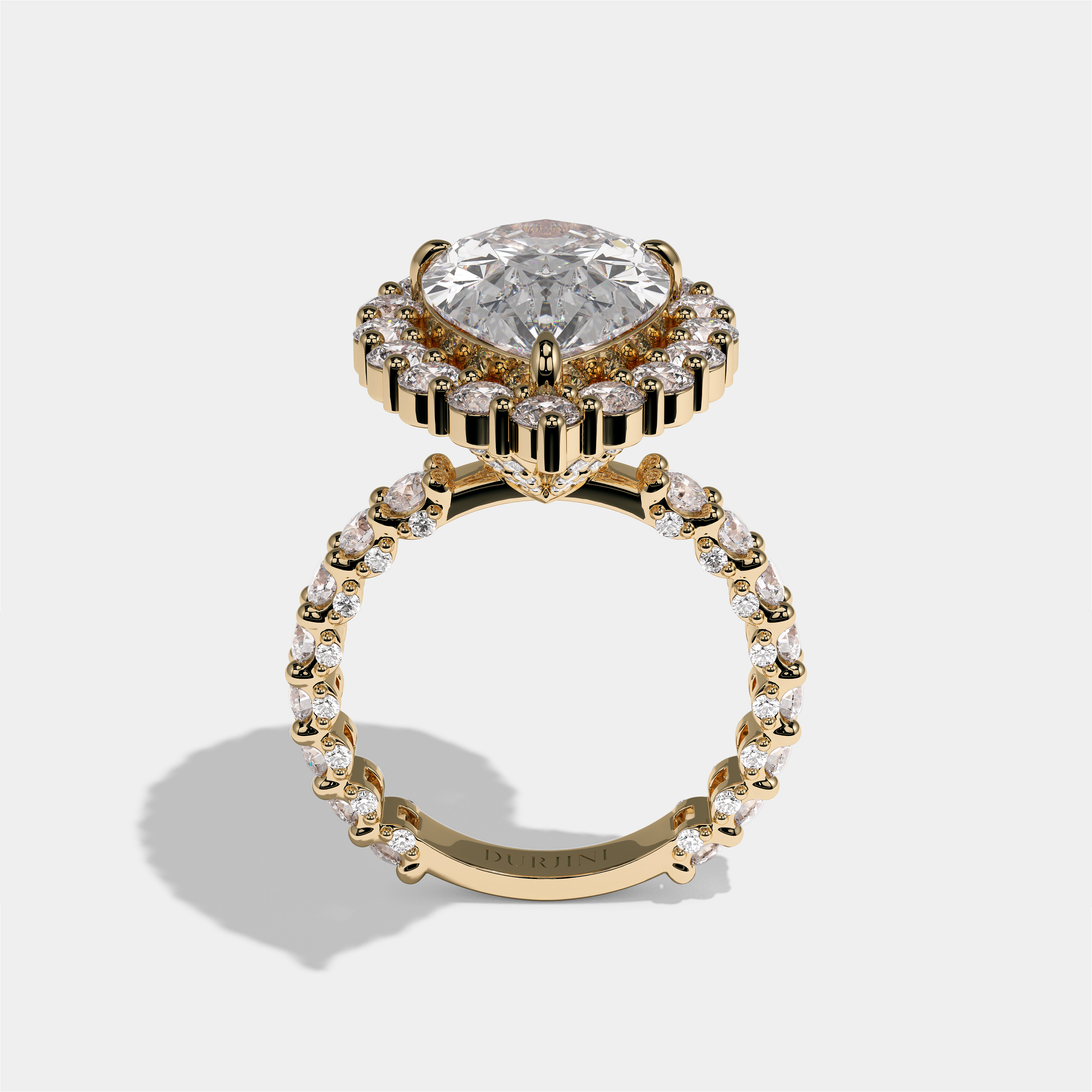 Judith Fairbourne diamond pear halo engagement ring in 18K yellow gold by Kurbãni Durjini, full view