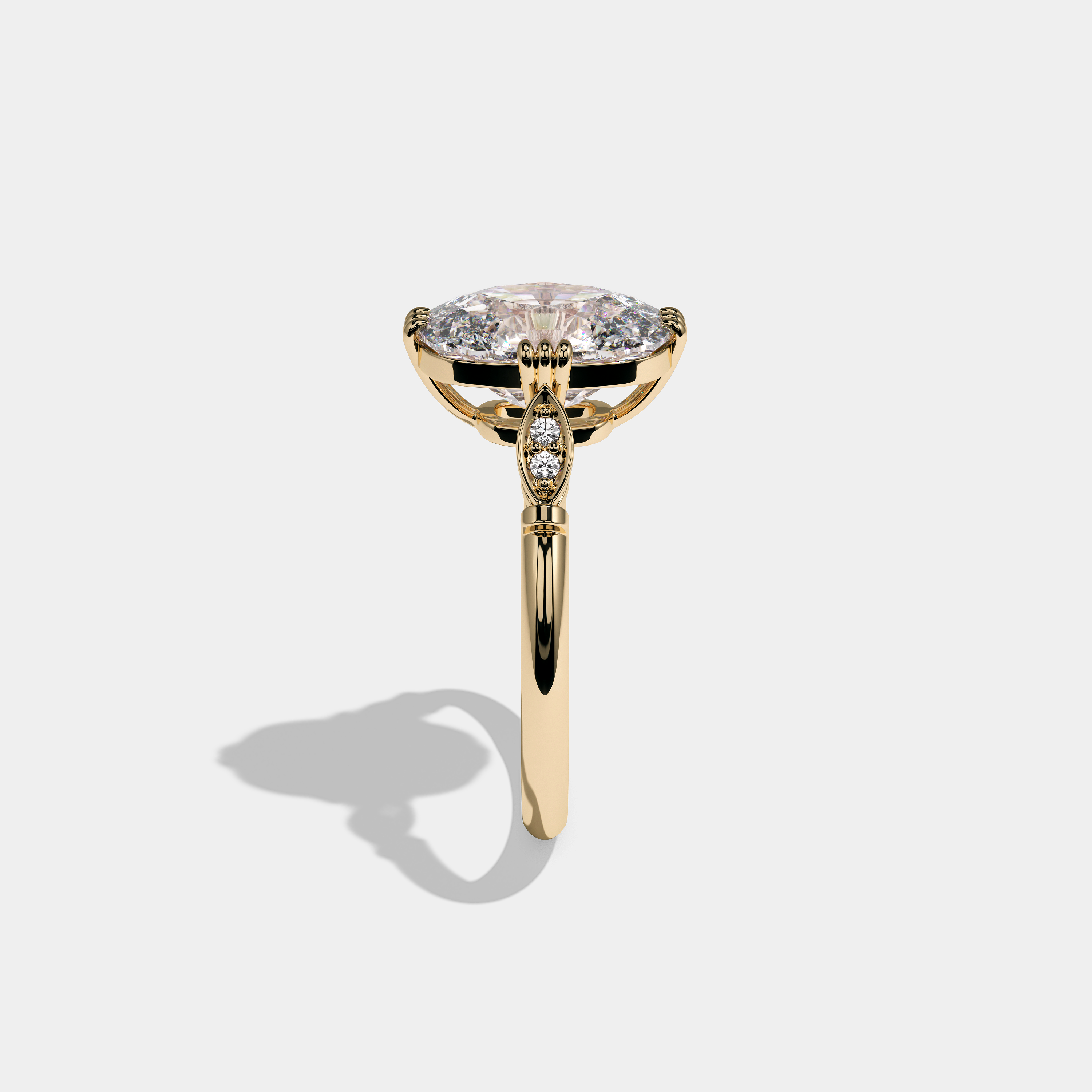 Ayala Kingsmere diamond cushion halo engagement ring in 18K yellow gold by Kurbãni Durjini, side view