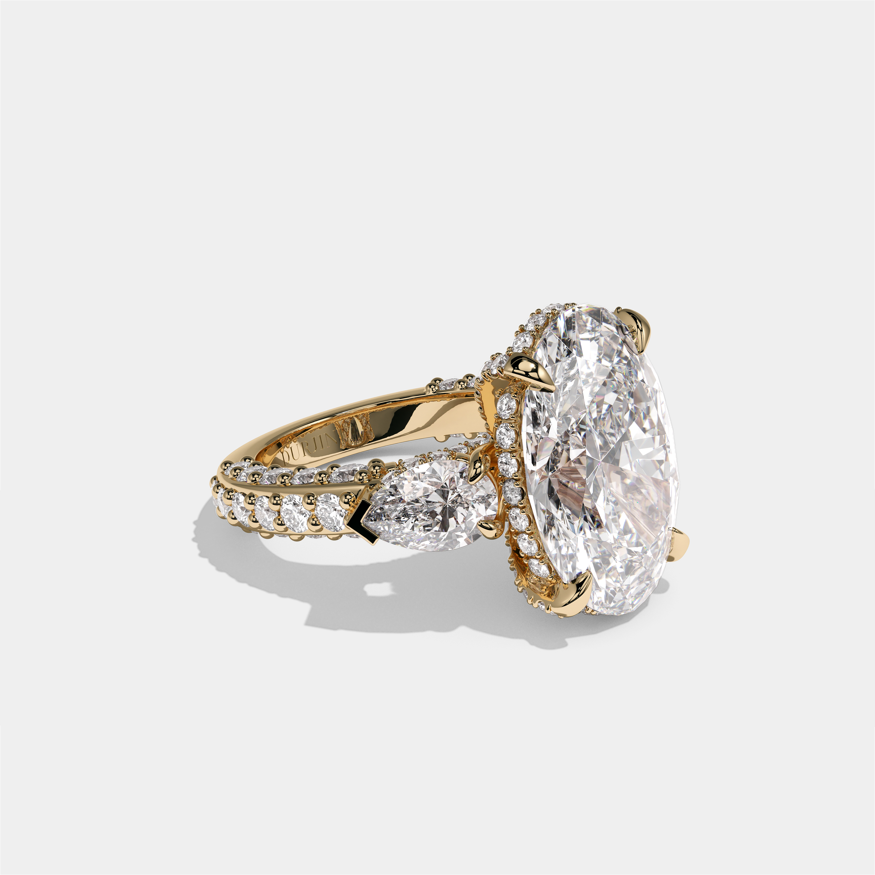 Shira Ravenscourt diamond oval halo engagement ring in 18K yellow gold by Kurbãni Durjini, right view