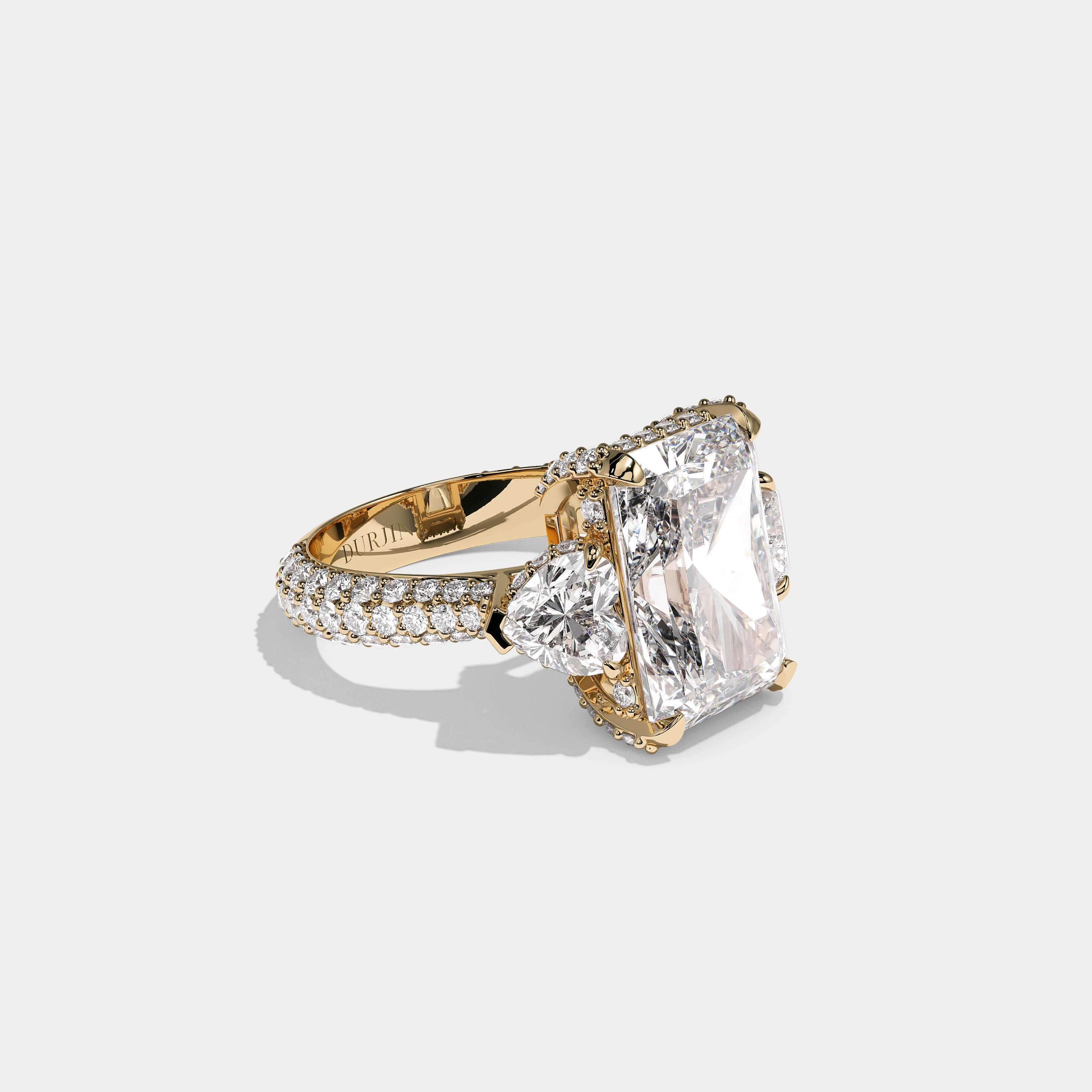 Mira Ellington 12.00ct diamond radiant halo engagement ring in 18K yellow gold by Kurbãni Durjini, right view