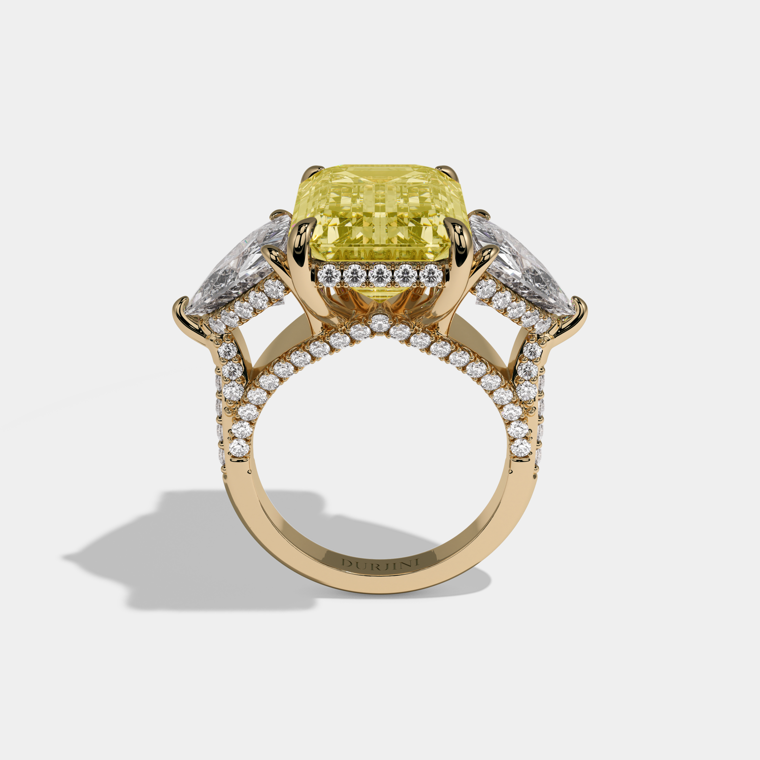 Arabella Fancy Yellow Emerald Cut Diamond Halo With Twin Trillion Cut Sides Engagement Ring 10ct 18K Yellow Gold