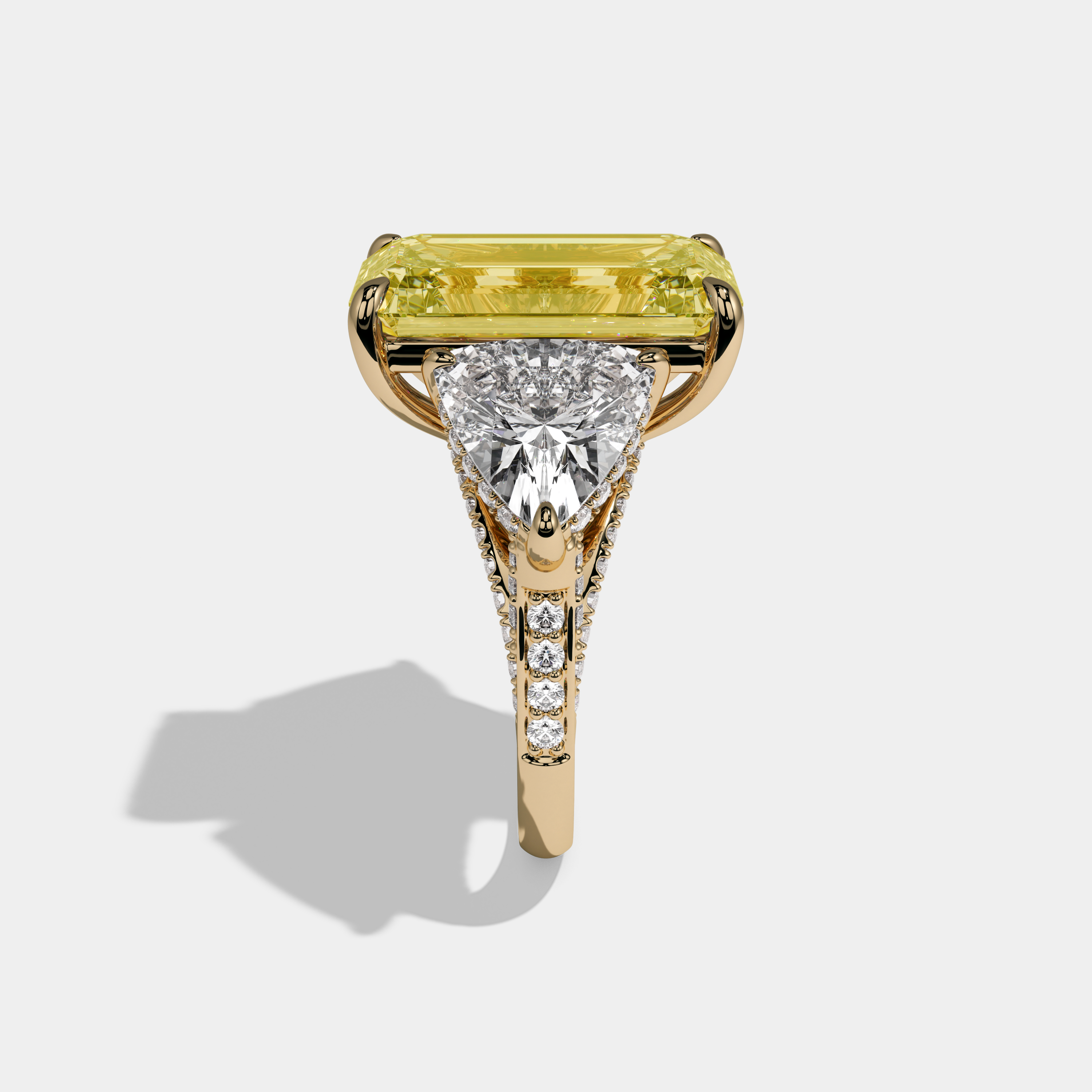 Arabella Fancy Yellow Emerald Cut Diamond Halo With Twin Trillion Cut Sides Engagement Ring 10ct 18K Yellow Gold
