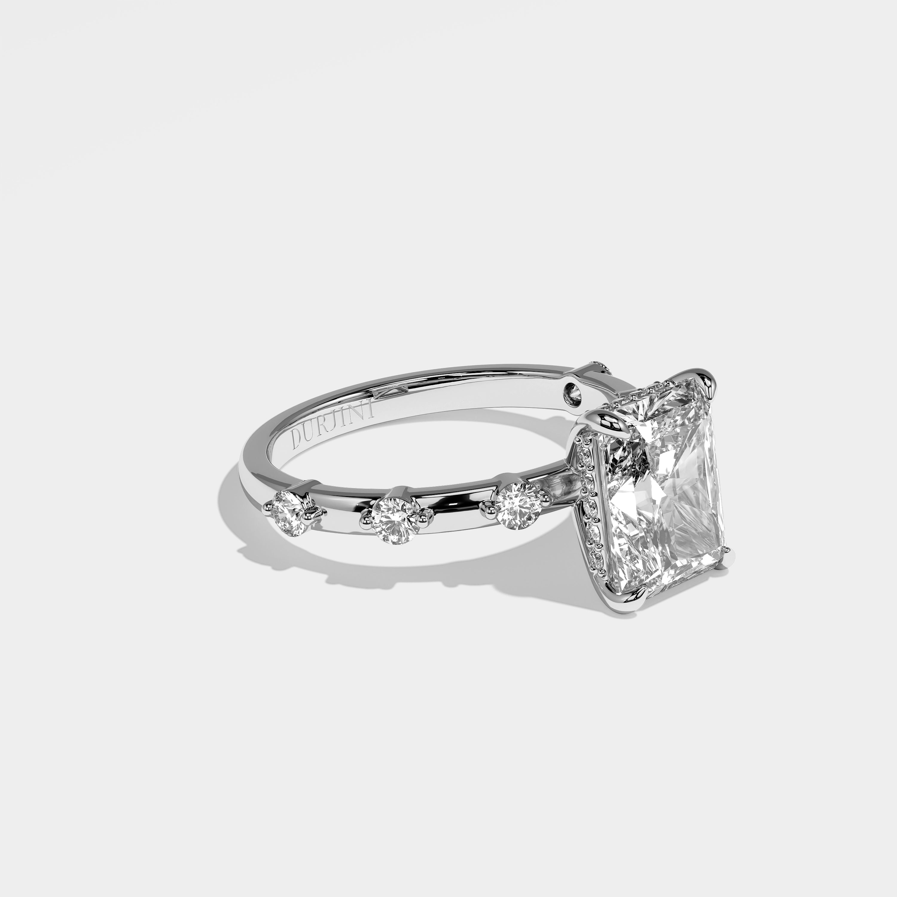 June radiant halo diamond engagement ring in 18K white gold by Kurbãni Durjini, right view