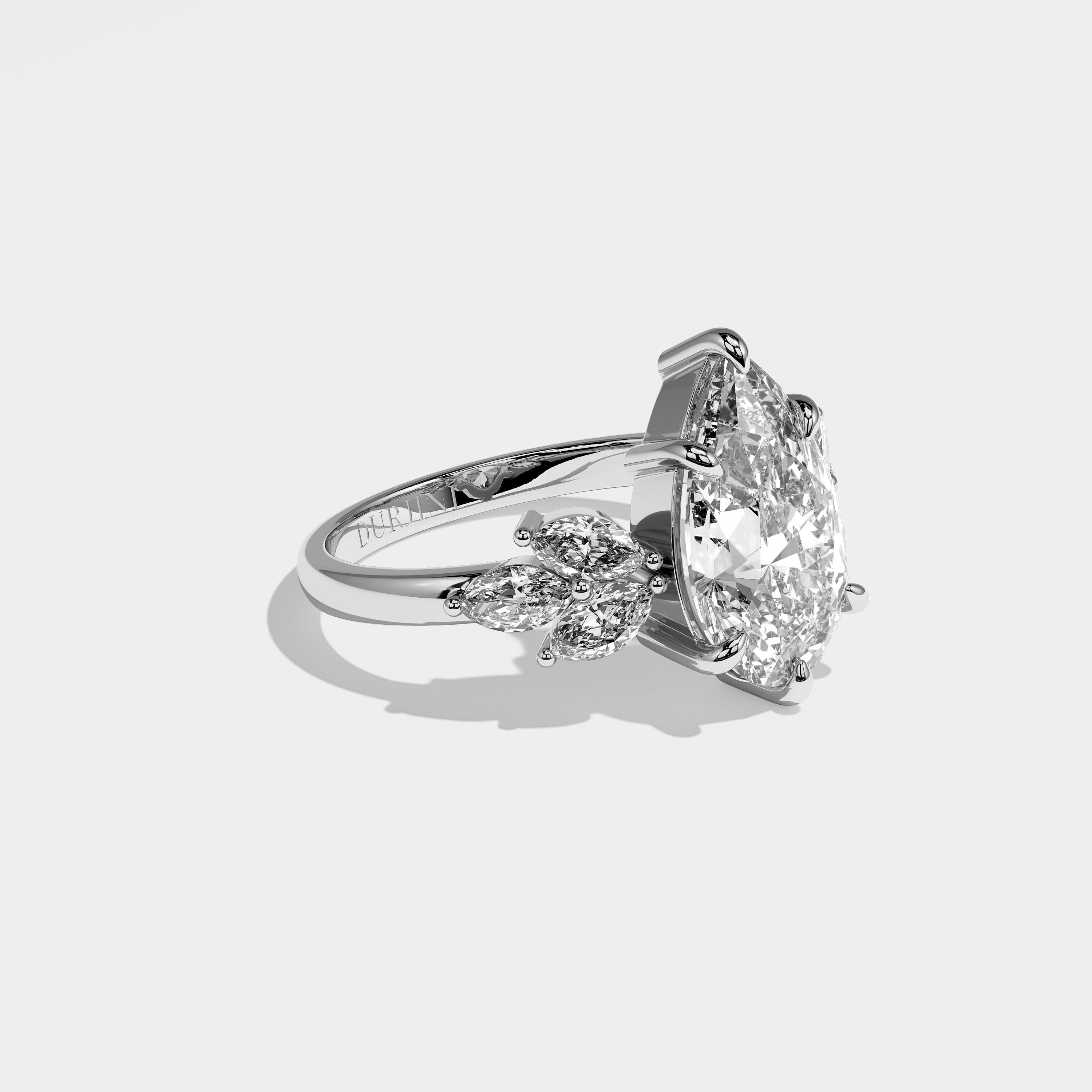 Hollow pear diamond engagement ring in 18K white gold by Kurbãni Durjini, right view