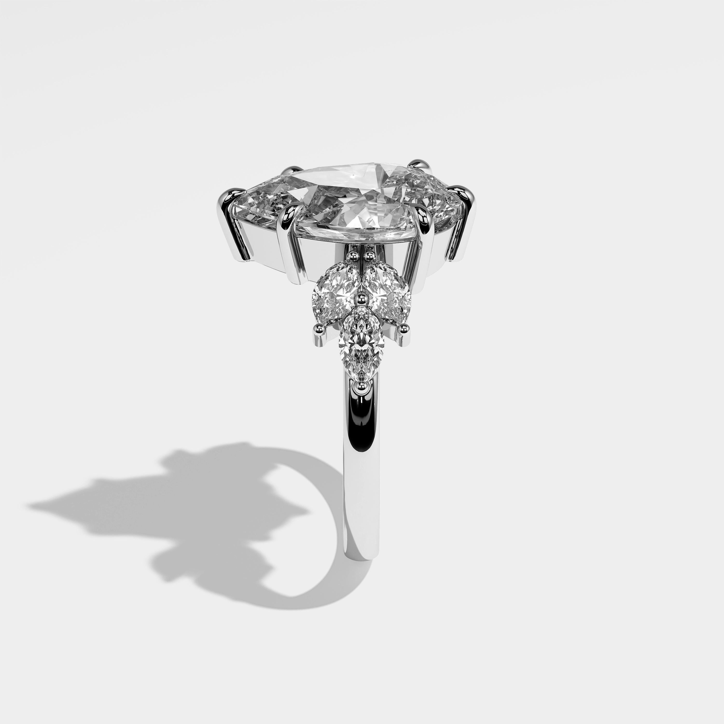 Hollow pear diamond engagement ring in 18K white gold by Kurbãni Durjini, side view