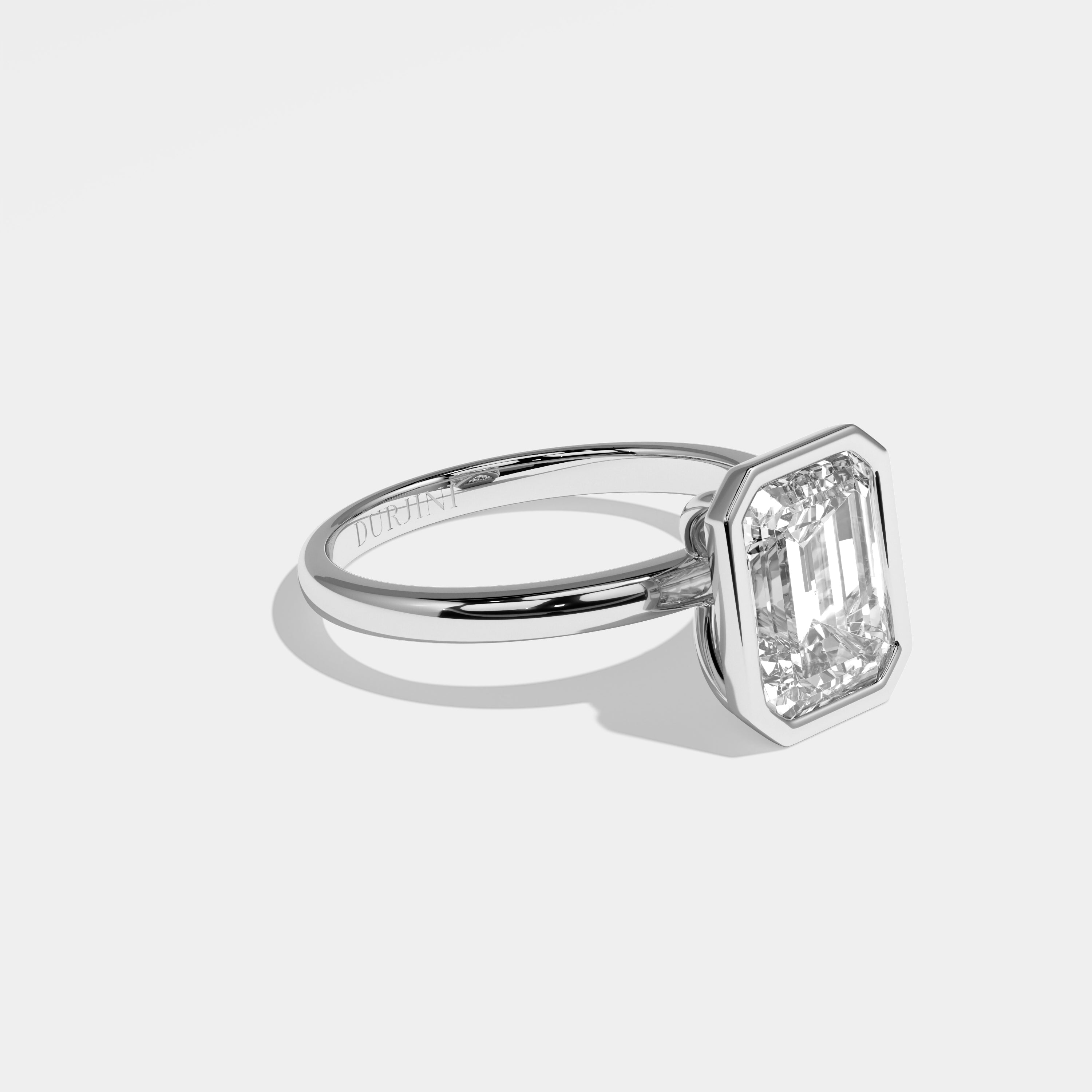 Pope emerald-cut diamond engagement ring in 18K white gold by Kurbãni Durjini, right view