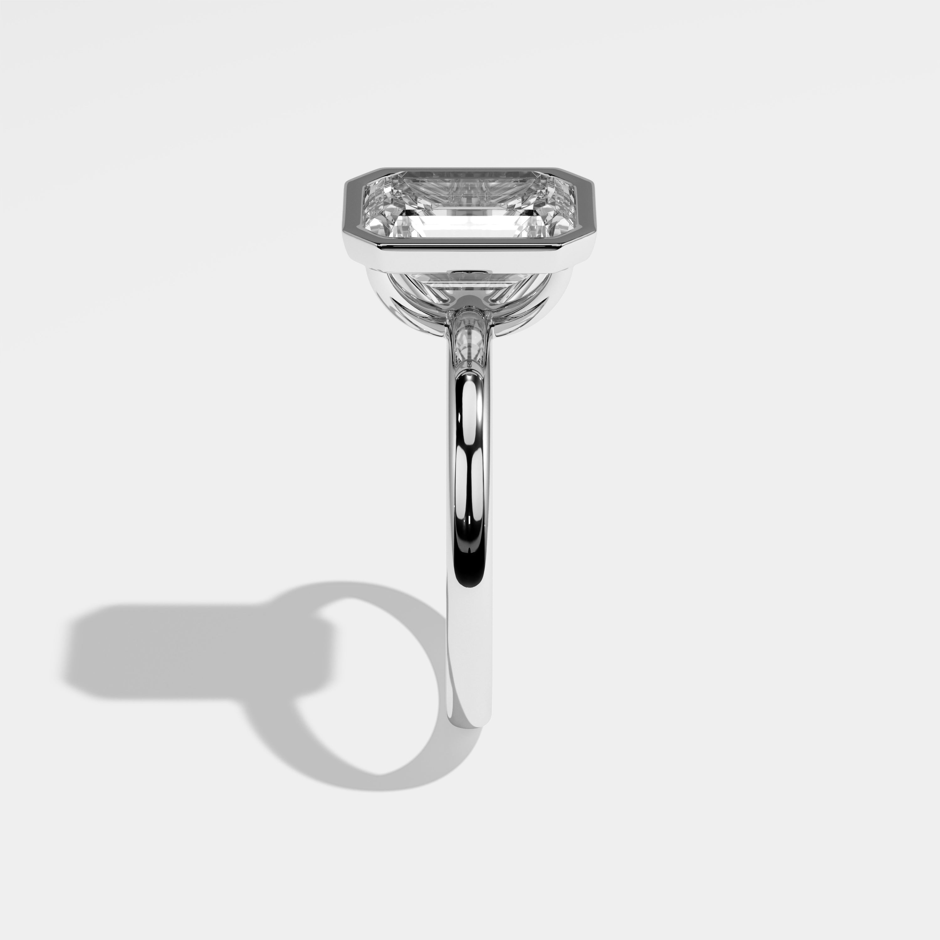 Pope emerald-cut diamond engagement ring in 18K white gold by Kurbãni Durjini, side view