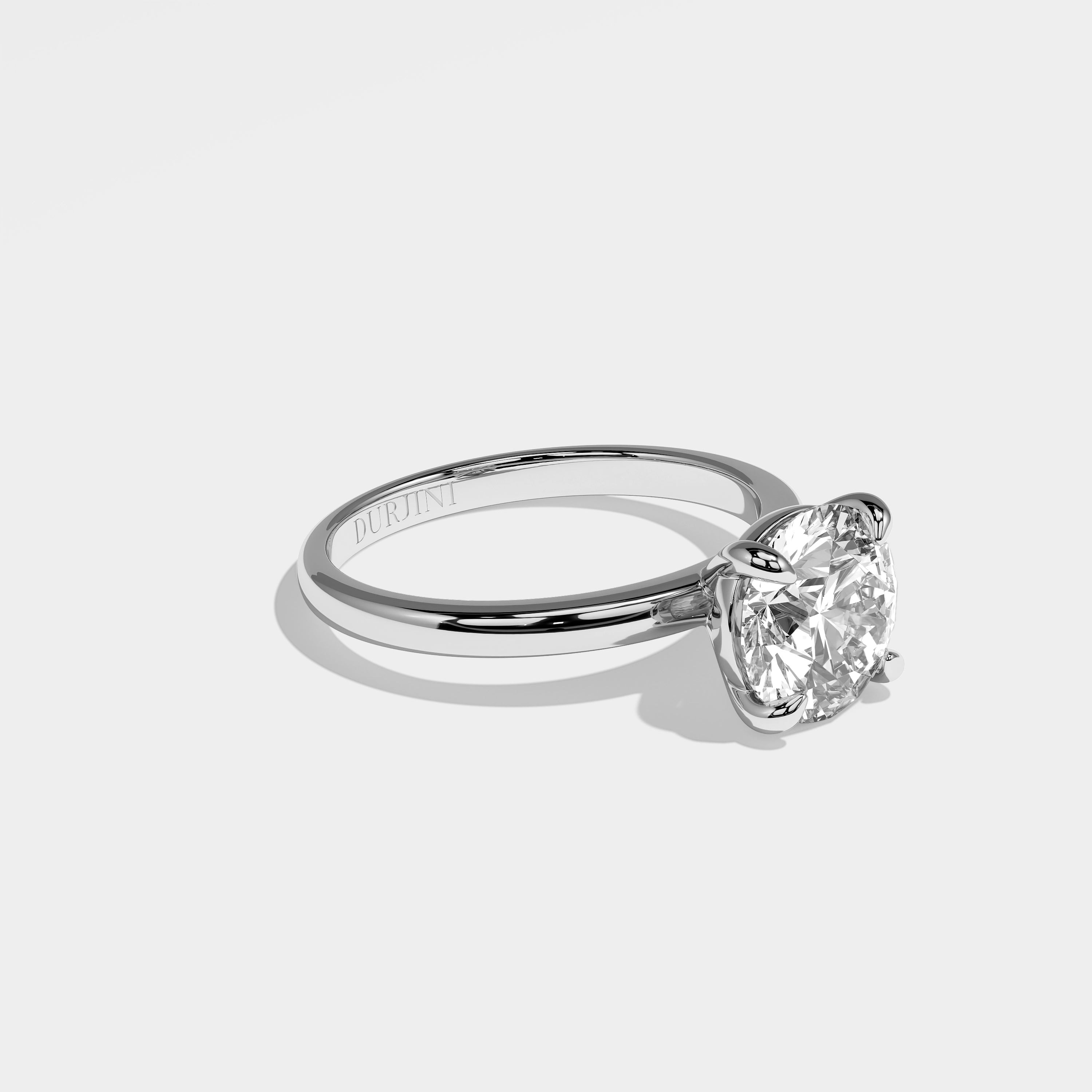 Stone round brilliant diamond engagement ring in 18K white gold by Kurbãni Durjini, right view