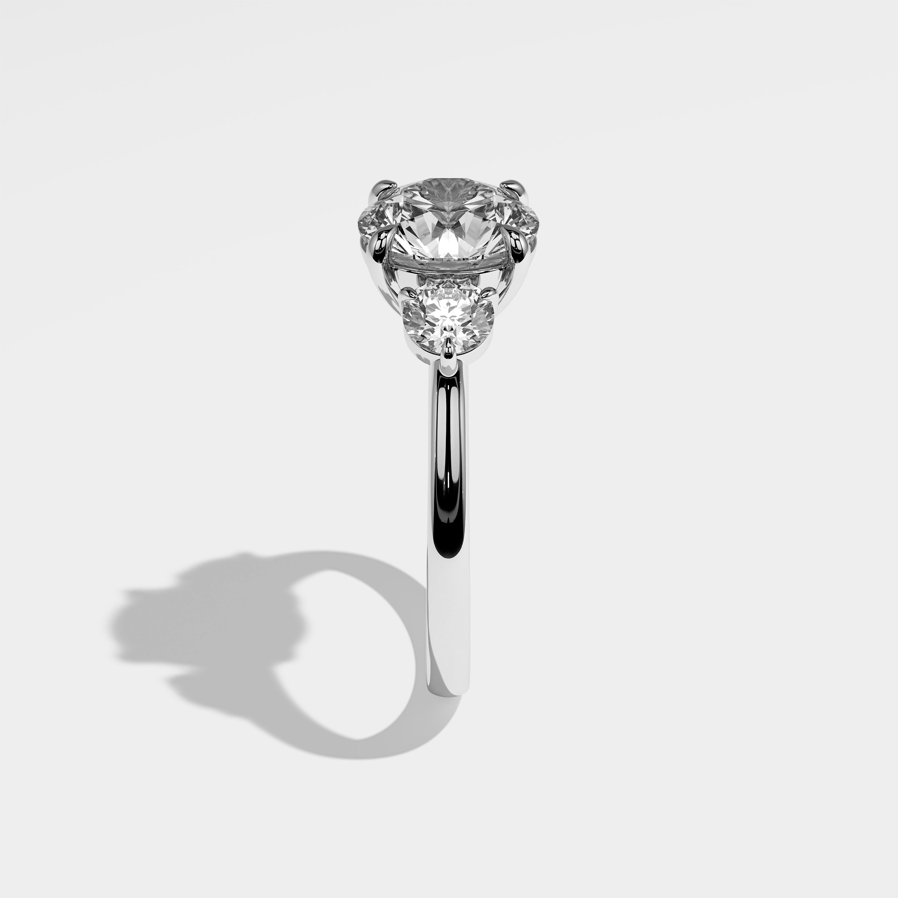 Olden round brilliant diamond engagement ring in 18K white gold by Kurbãni Durjini, side view