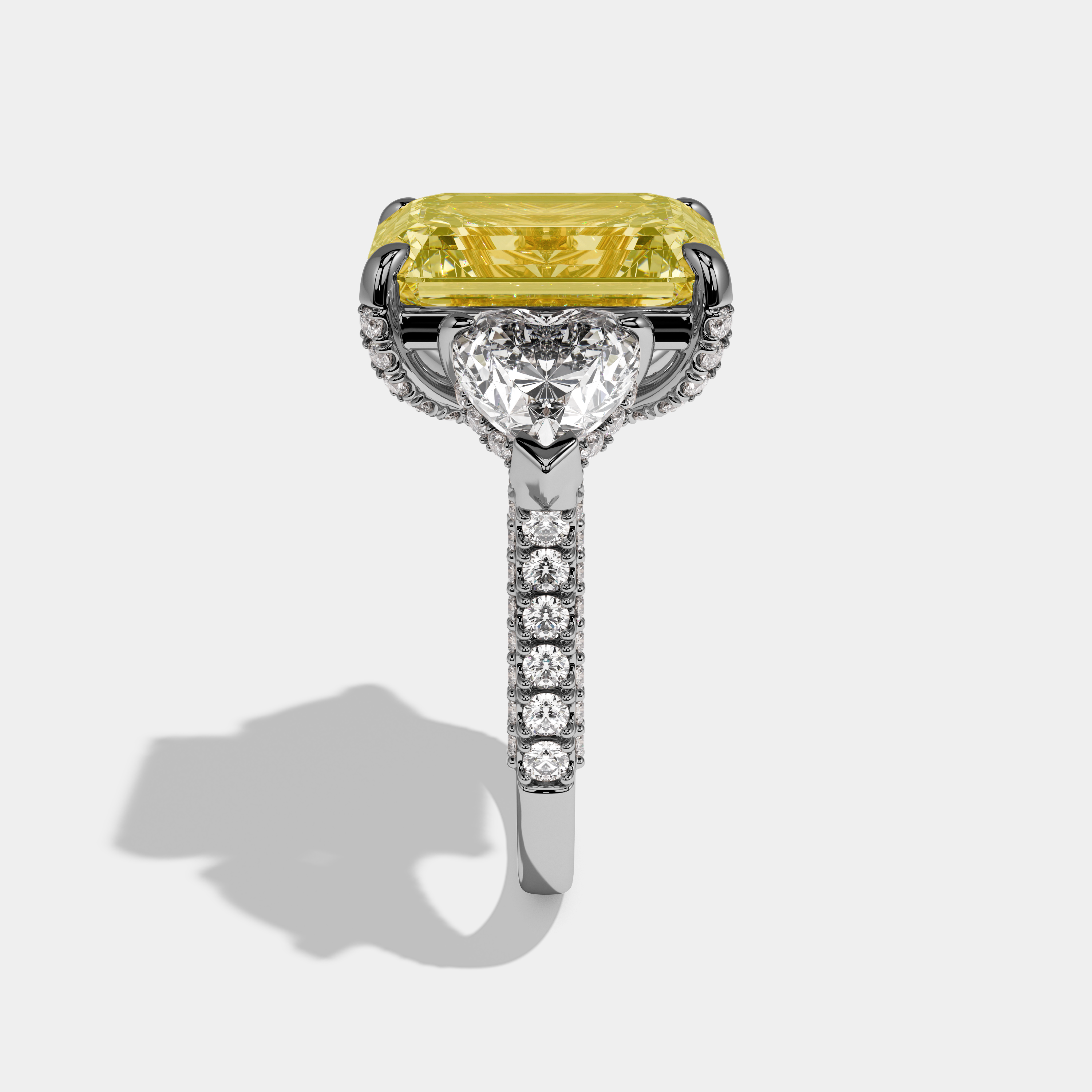 Madison Fancy Yellow Emerald Cut Diamond Halo With Brilliant Cut Heart Side Diamond Band Engagement Ring 10ct 18k White Gold