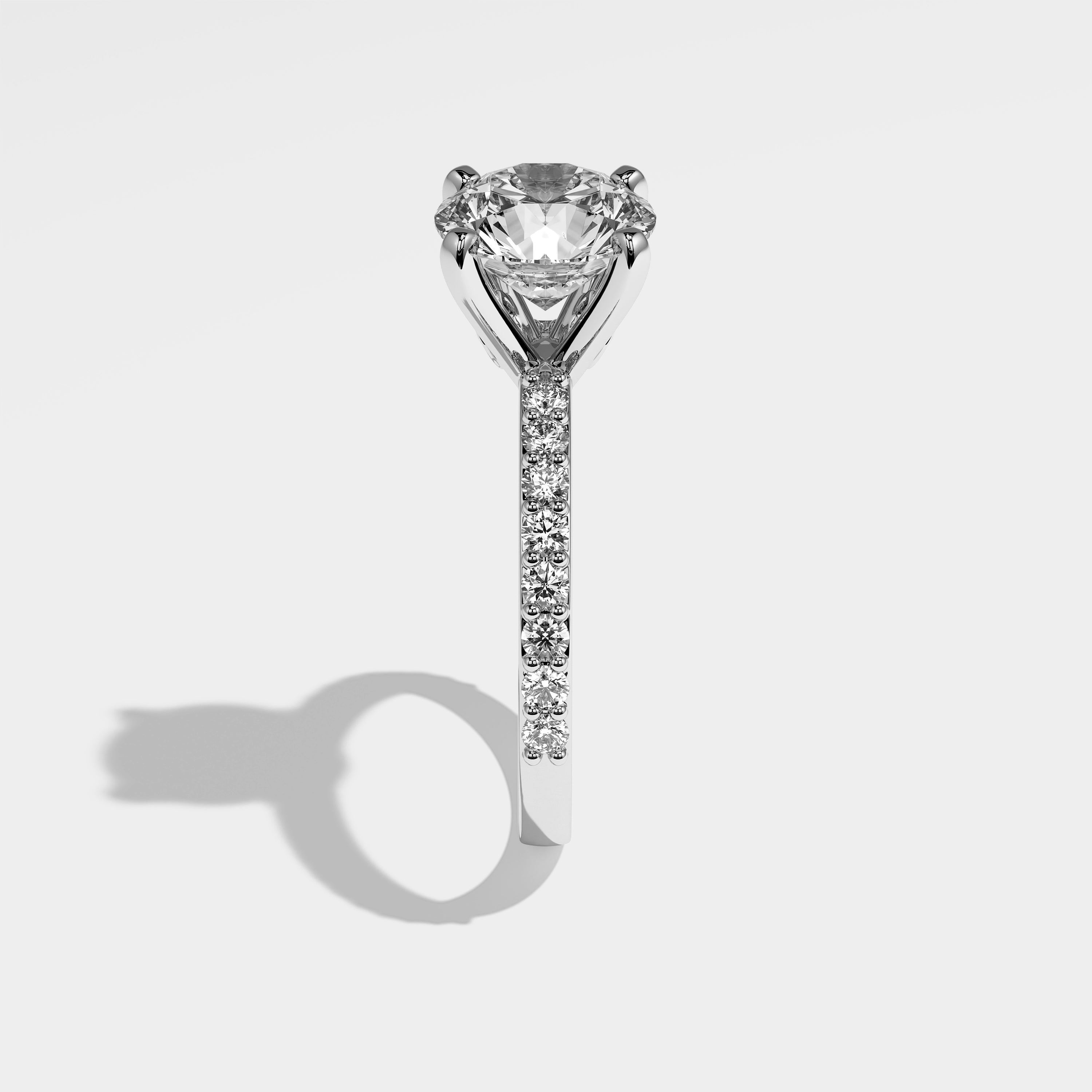 Shard round brilliant diamond engagement ring in 18K white gold by Kurbãni Durjini, side view