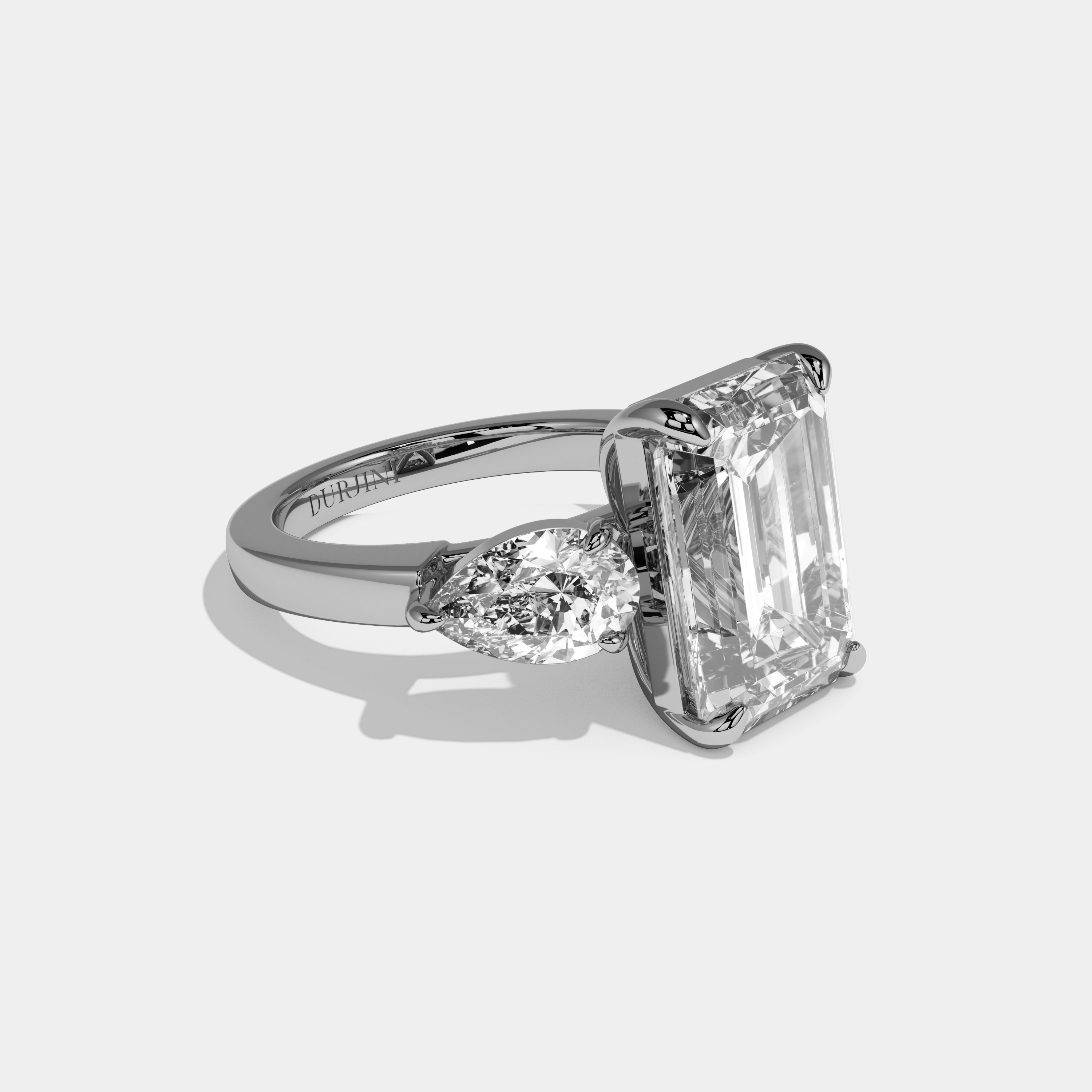 Amelia Emerald Cut Diamond Plain Band With Pear Sides Engagement Ring 10ct 18k White Gold