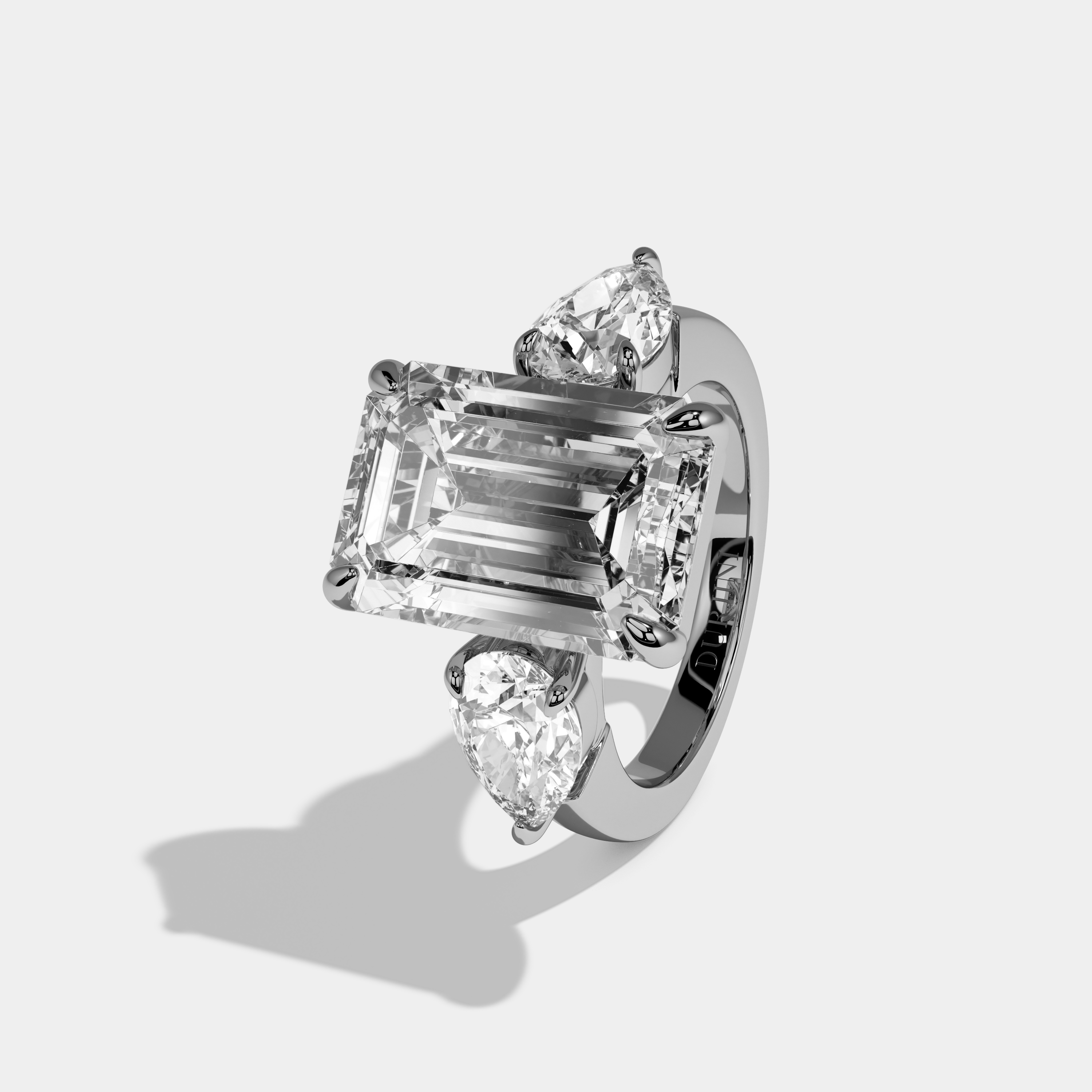 Amelia Emerald Cut Diamond Plain Band With Pear Sides Engagement Ring 10ct 18k White Gold
