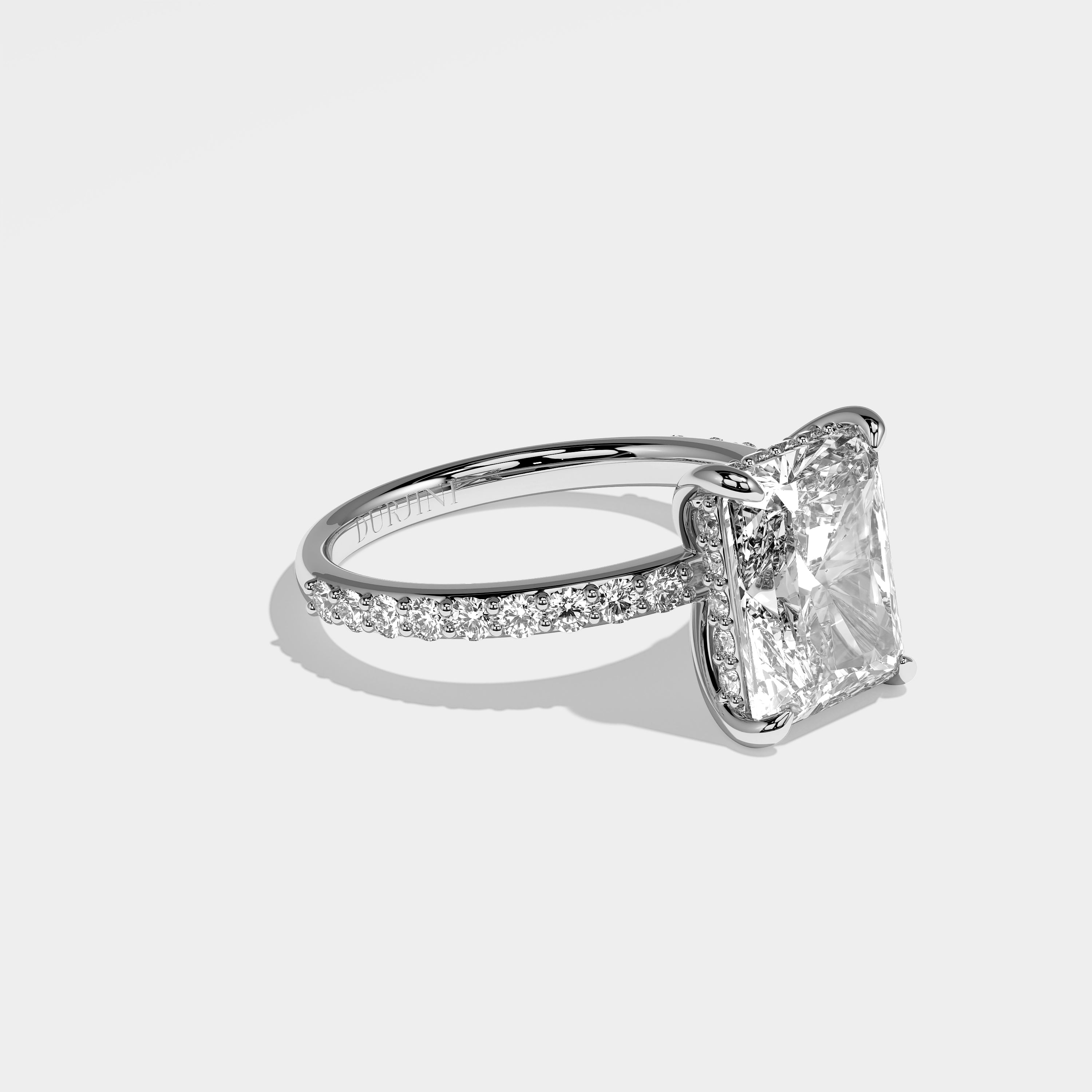 Angel radiant halo diamond engagement ring in 18K white gold by Kurbãni Durjini, right view