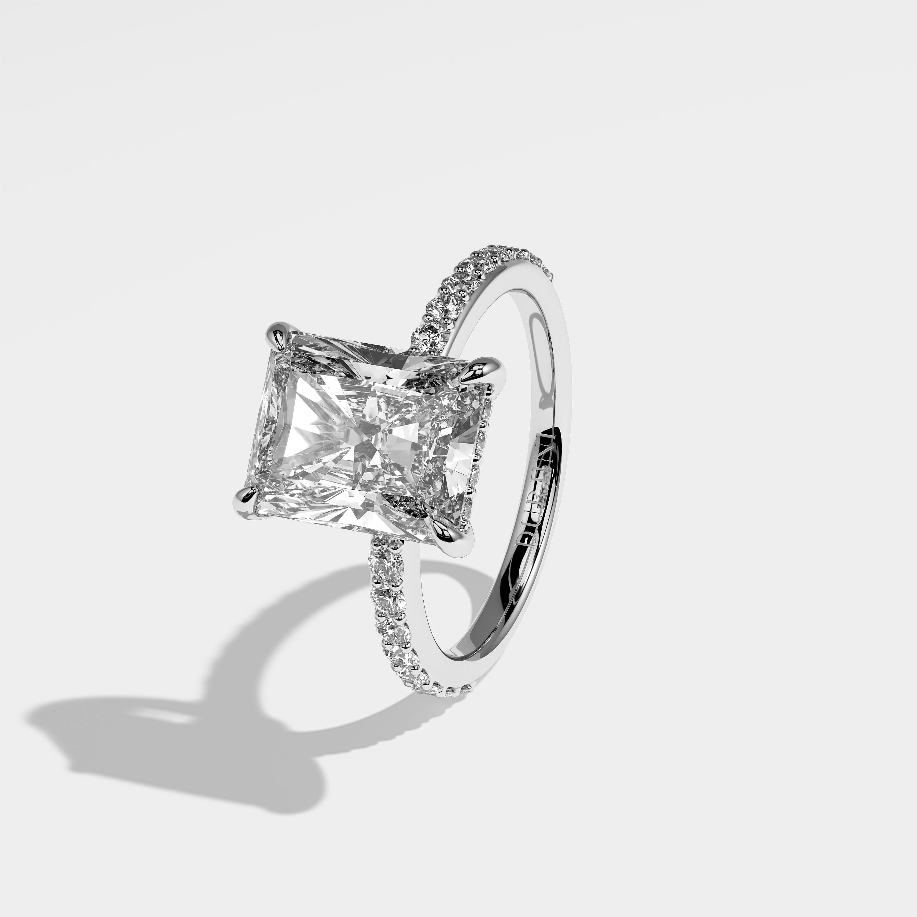 Angel radiant halo diamond engagement ring in 18K white gold by Kurbãni Durjini, left view