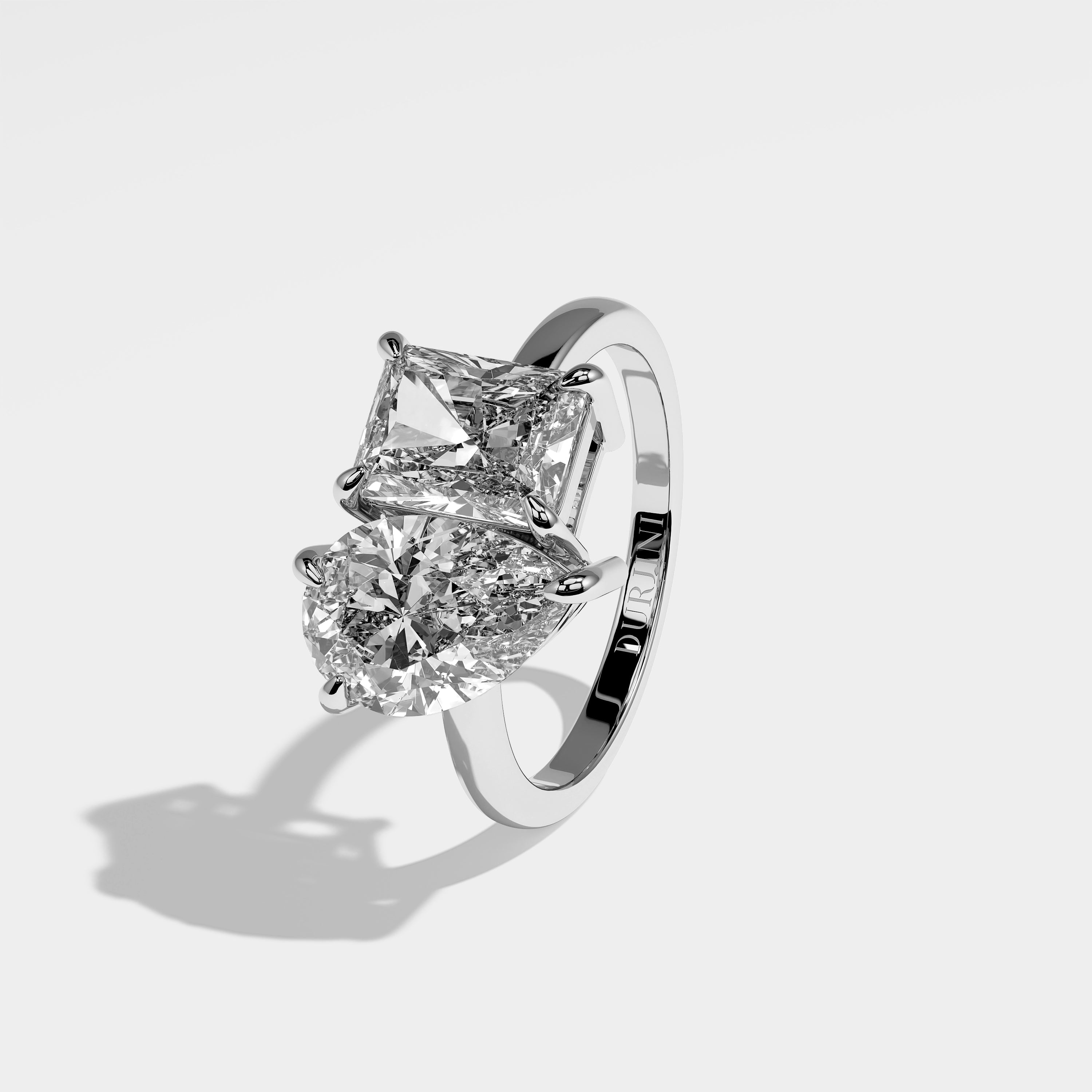 Heaven pear diamond engagement ring in 18K white gold by Kurbãni Durjini, left view