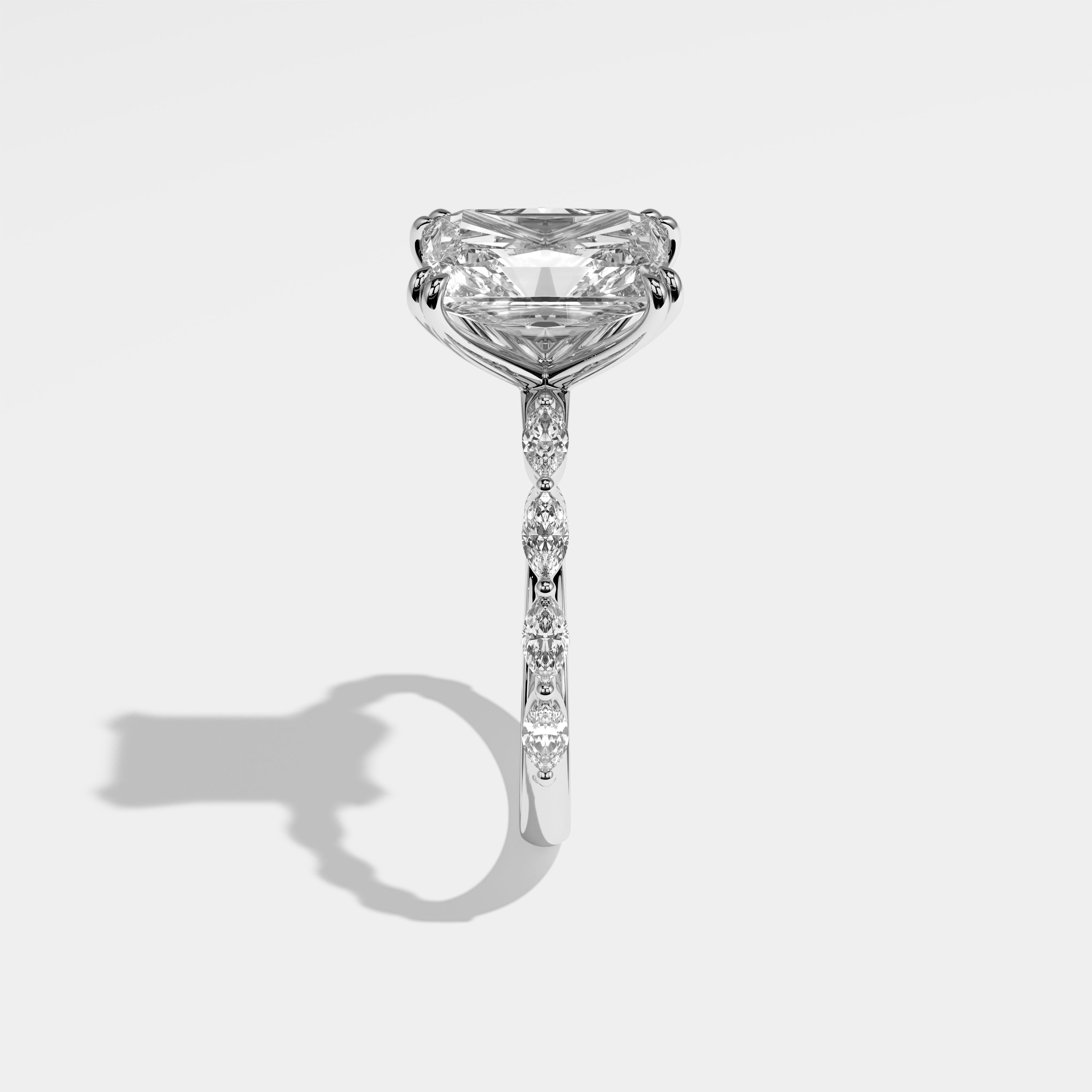Rook radiant halo diamond engagement ring in 18K white gold by Kurbãni Durjini, side view