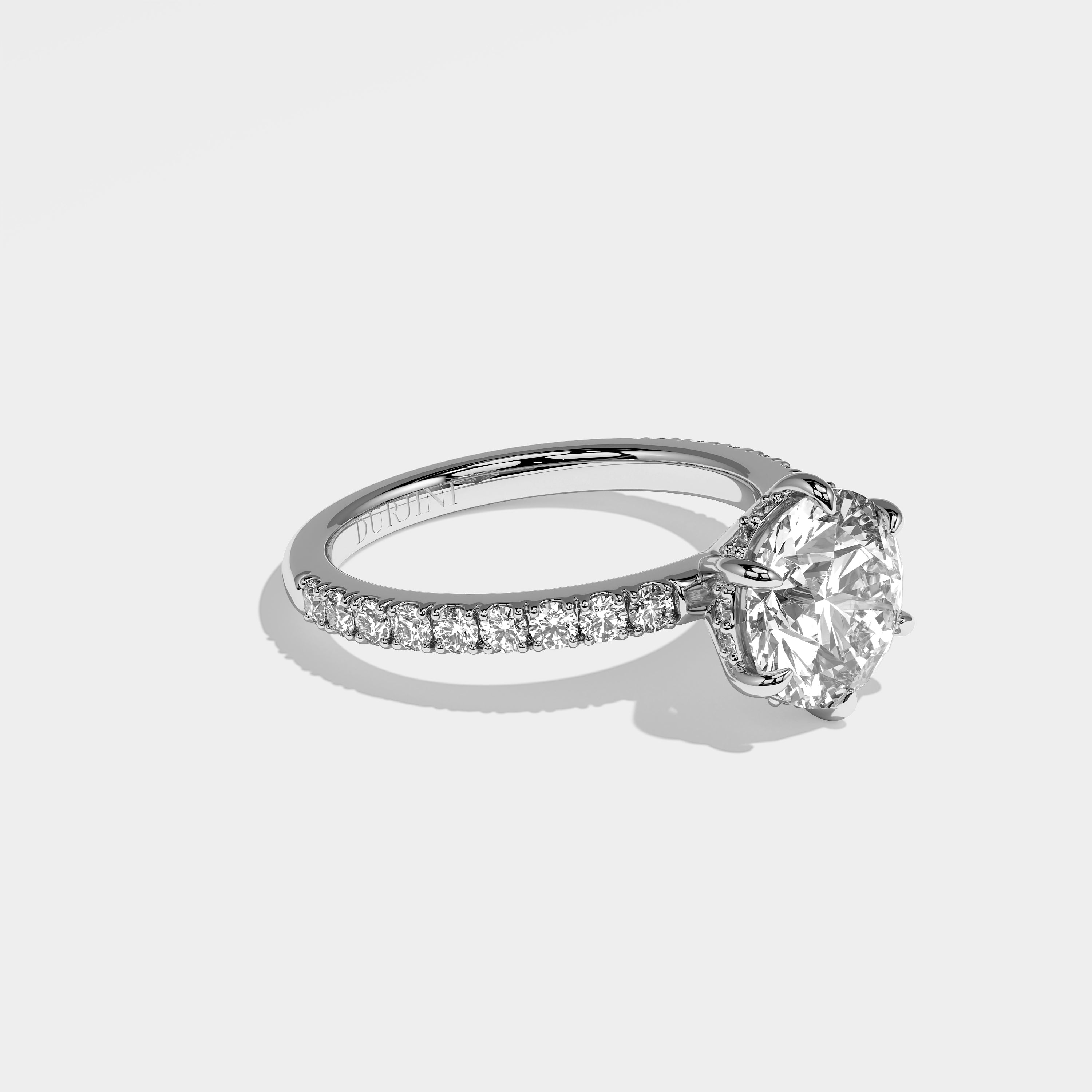 Moon round brilliant halo diamond engagement ring in 18K white gold by Kurbãni Durjini, right view