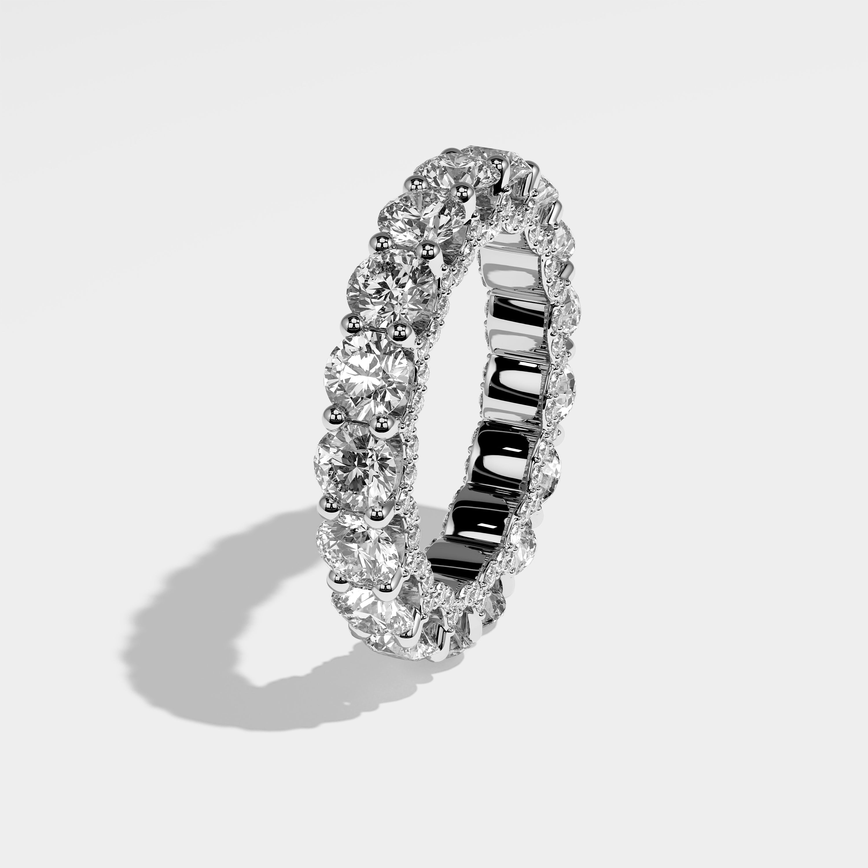 Forge round brilliant eternity diamond engagement ring in 18K white gold by Kurbãni Durjini, left view