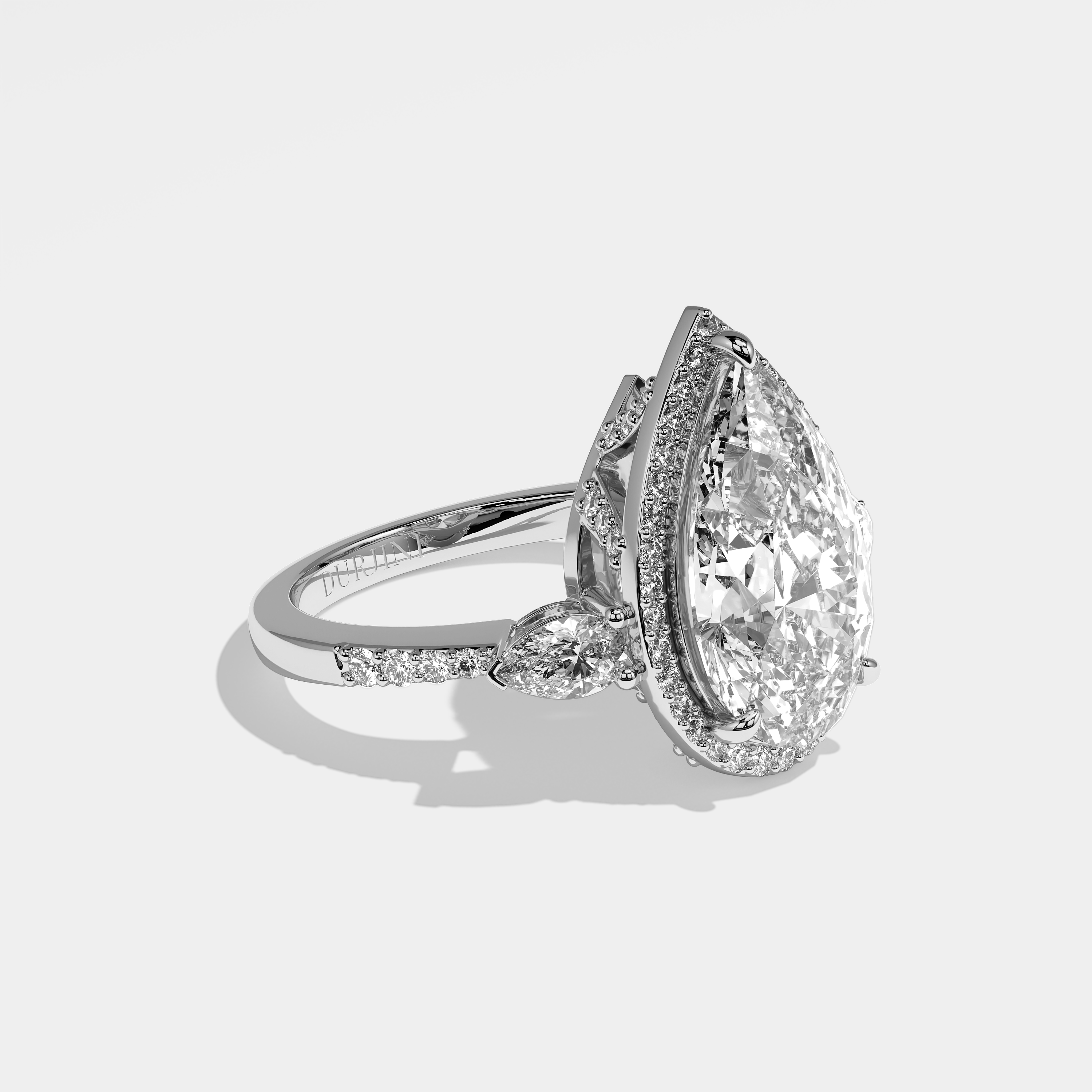 Michelle pear halo diamond engagement ring in 18K white gold by Kurbãni Durjini, right view
