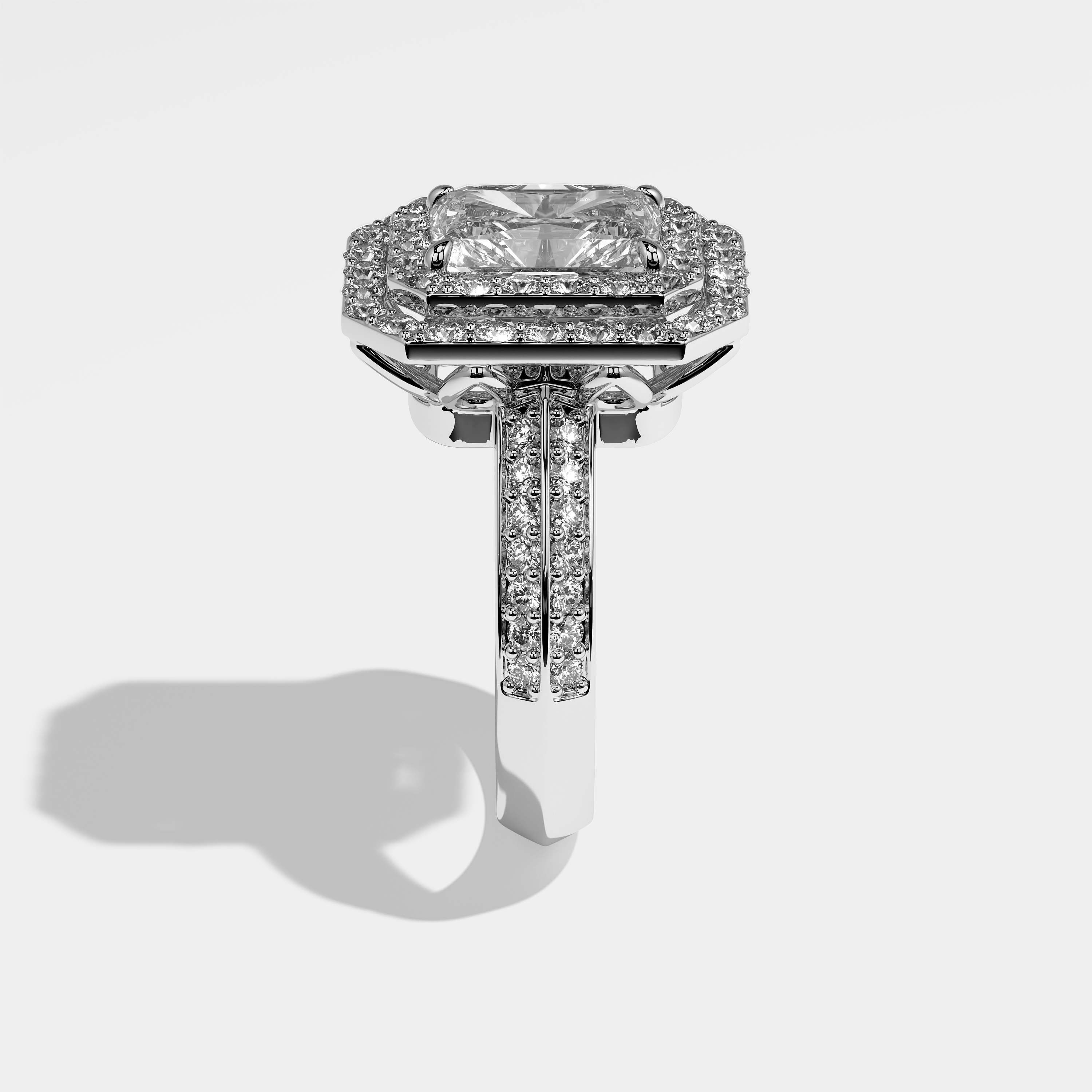 Caroline radiant halo diamond engagement ring in 18K white gold by Kurbãni Durjini, side view