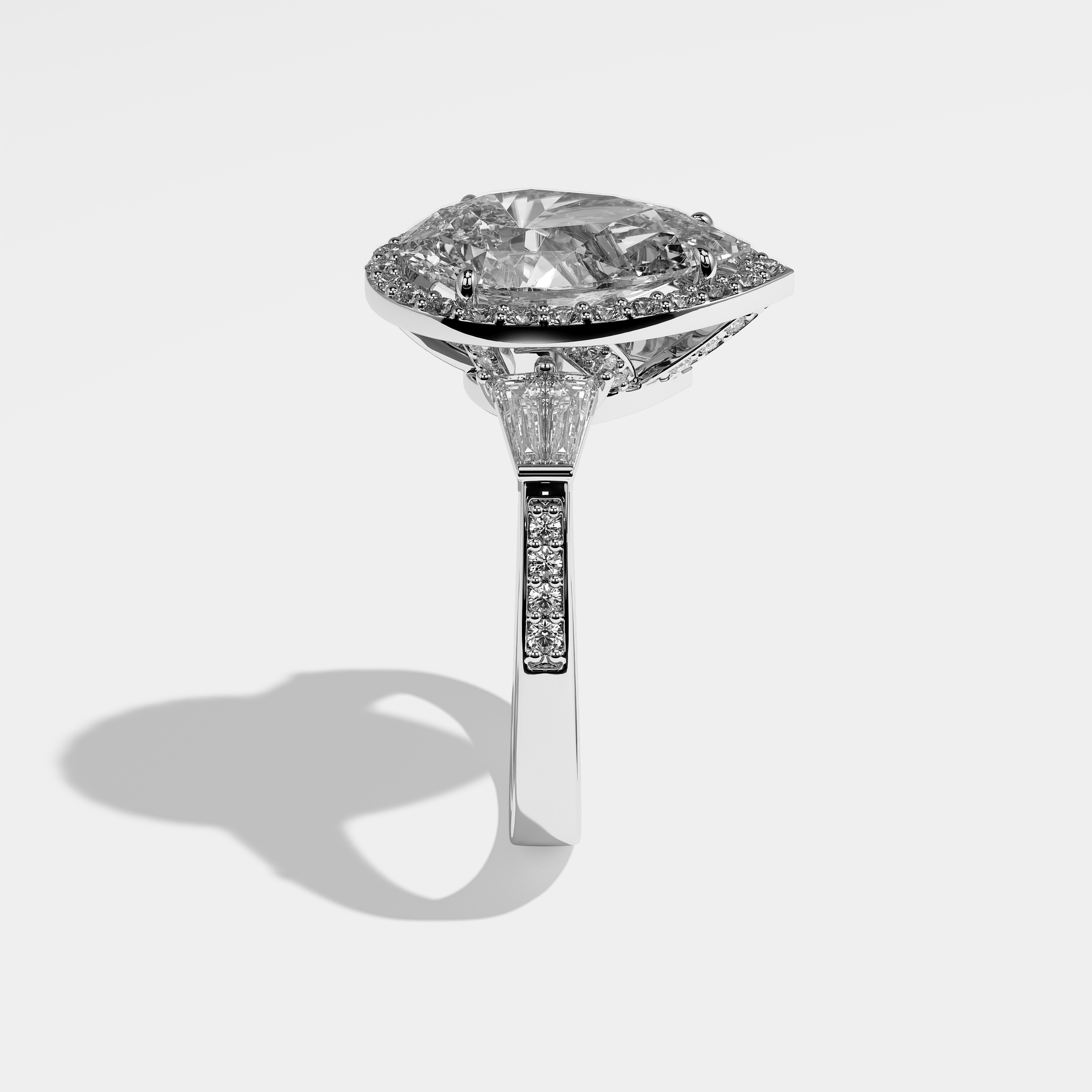 Harley pear halo diamond engagement ring in 18K white gold by Kurbãni Durjini, side view