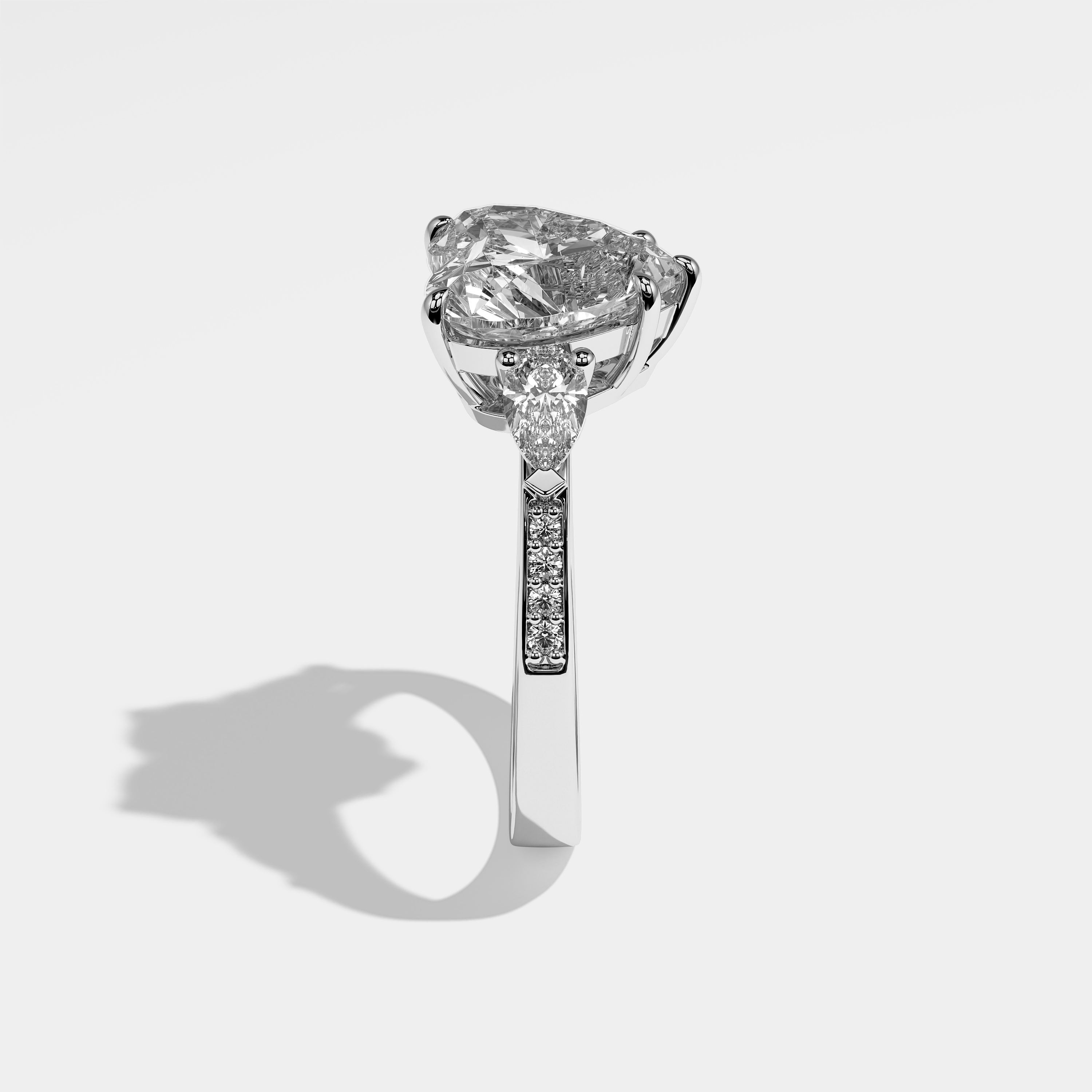 Giselle heart diamond engagement ring in 18K white gold by Kurbãni Durjini, side view