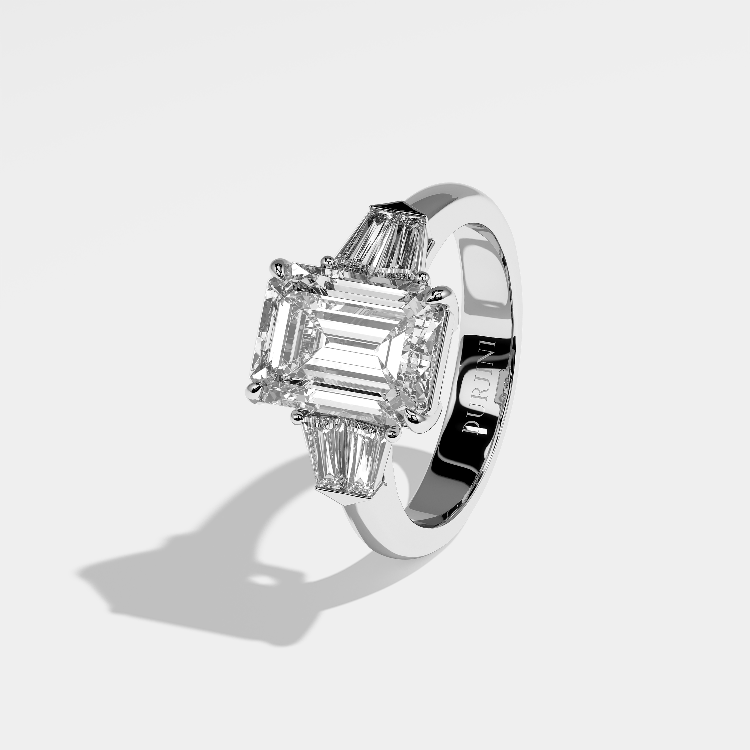 Ashley emerald diamond engagement ring in 18K white gold by Kurbãni Durjini, left view