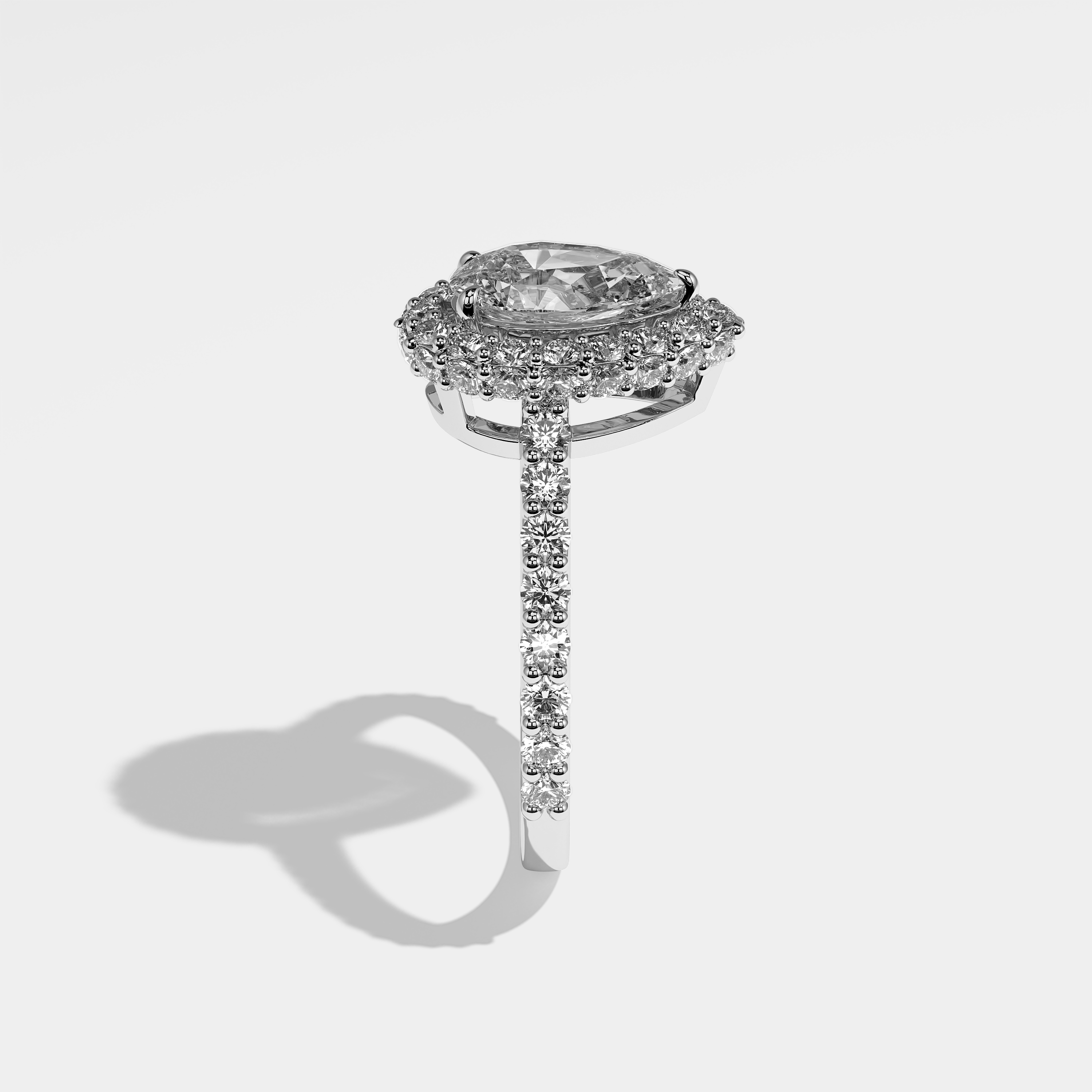 Lori pear halo diamond engagement ring in 18K white gold by Kurbãni Durjini, side view