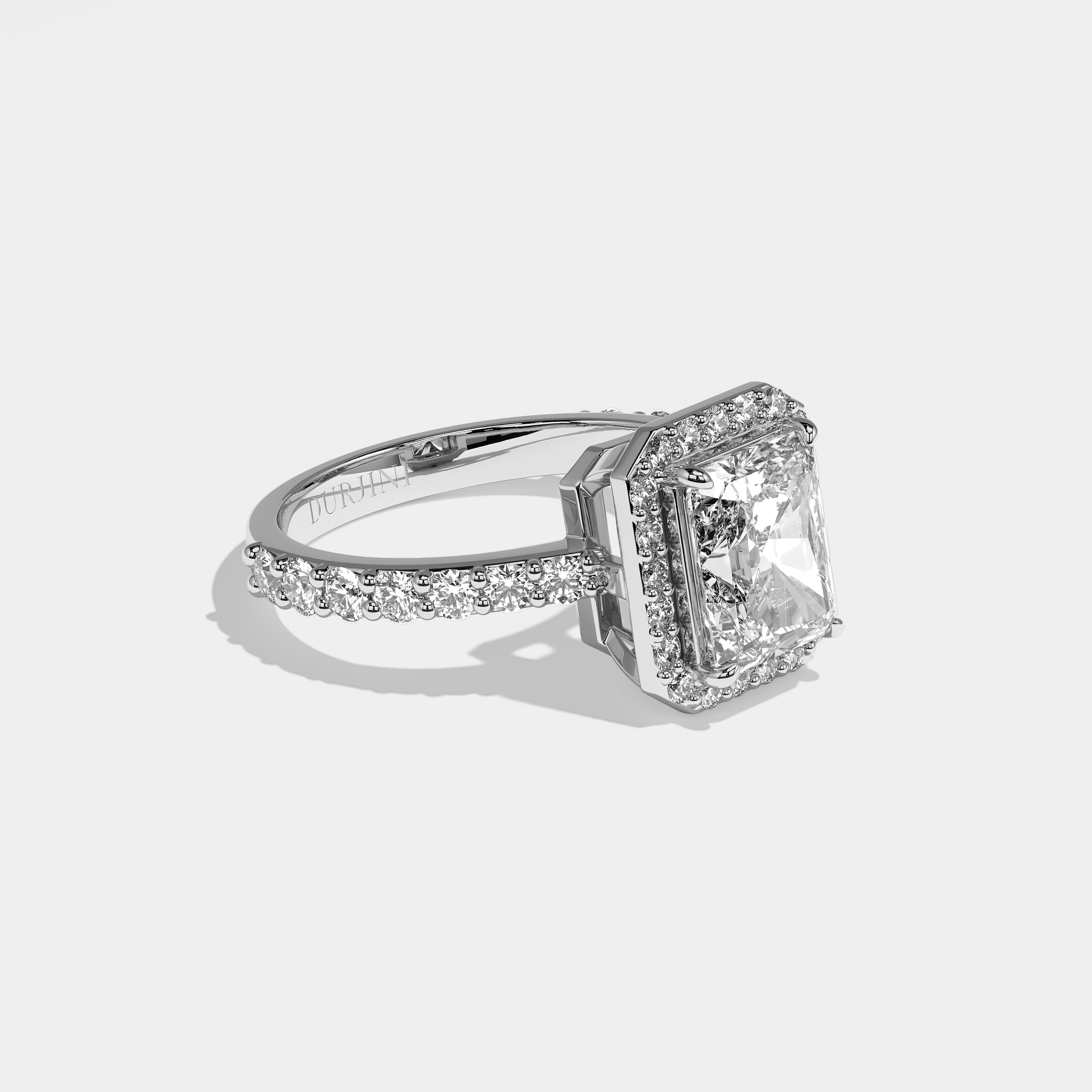 Nicola halo diamond engagement ring in 18K white gold by Kurbãni Durjini, right view