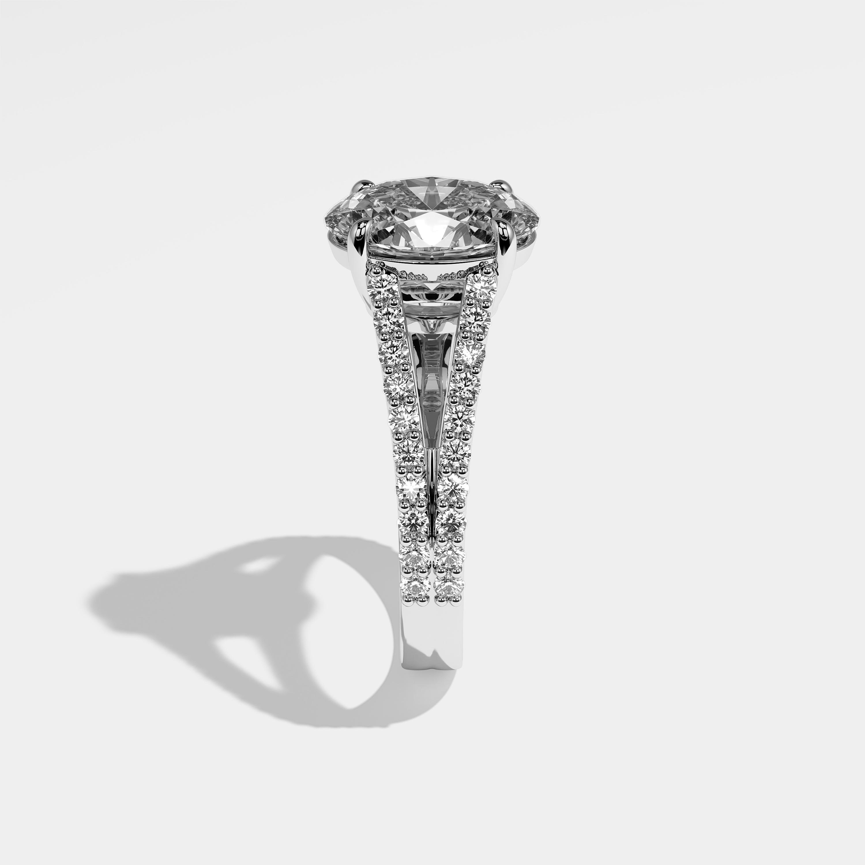 Raven oval diamond engagement ring in 18K white gold by Kurbãni Durjini, side view
