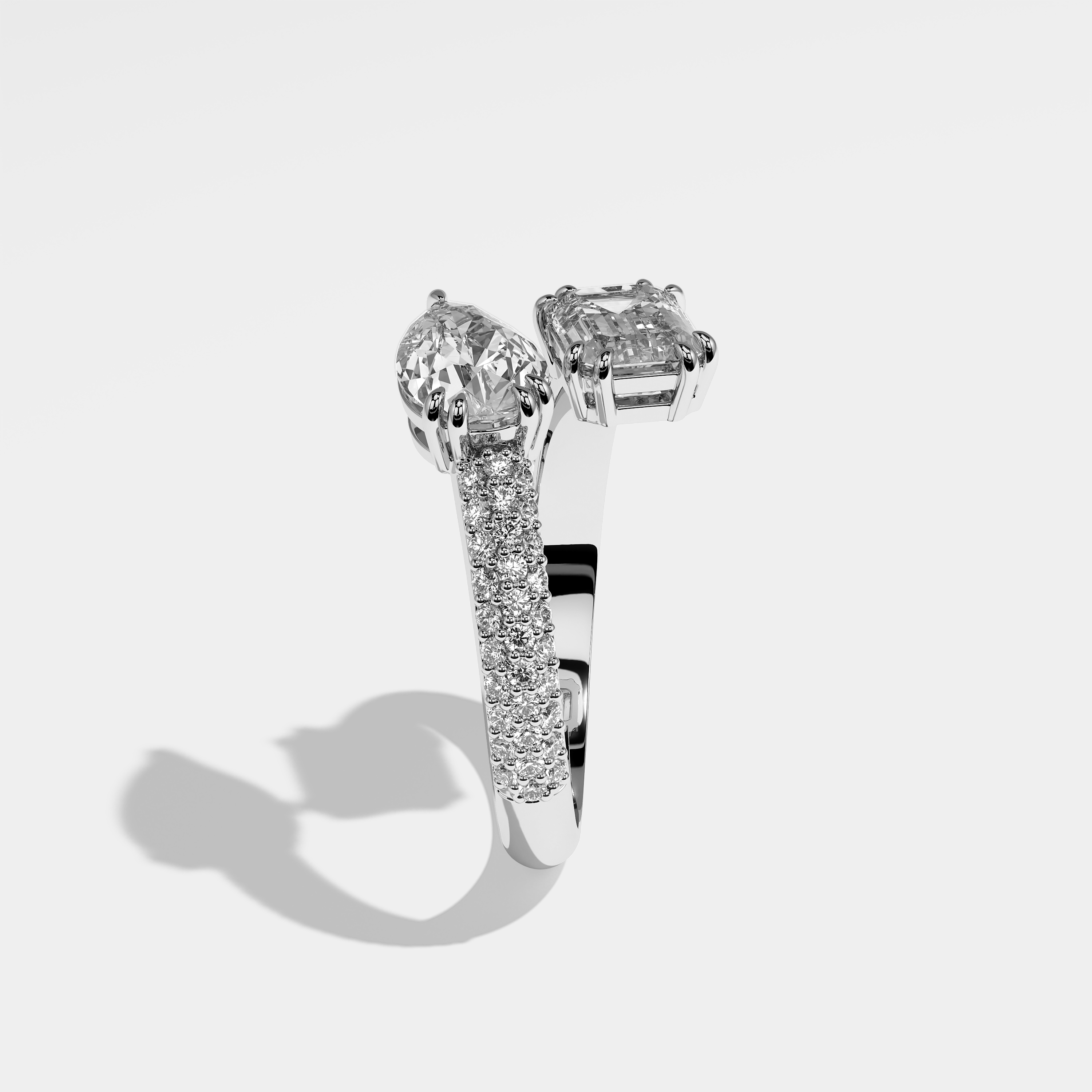 Heir pear diamond engagement ring in 18K white gold by Kurbãni Durjini, side view