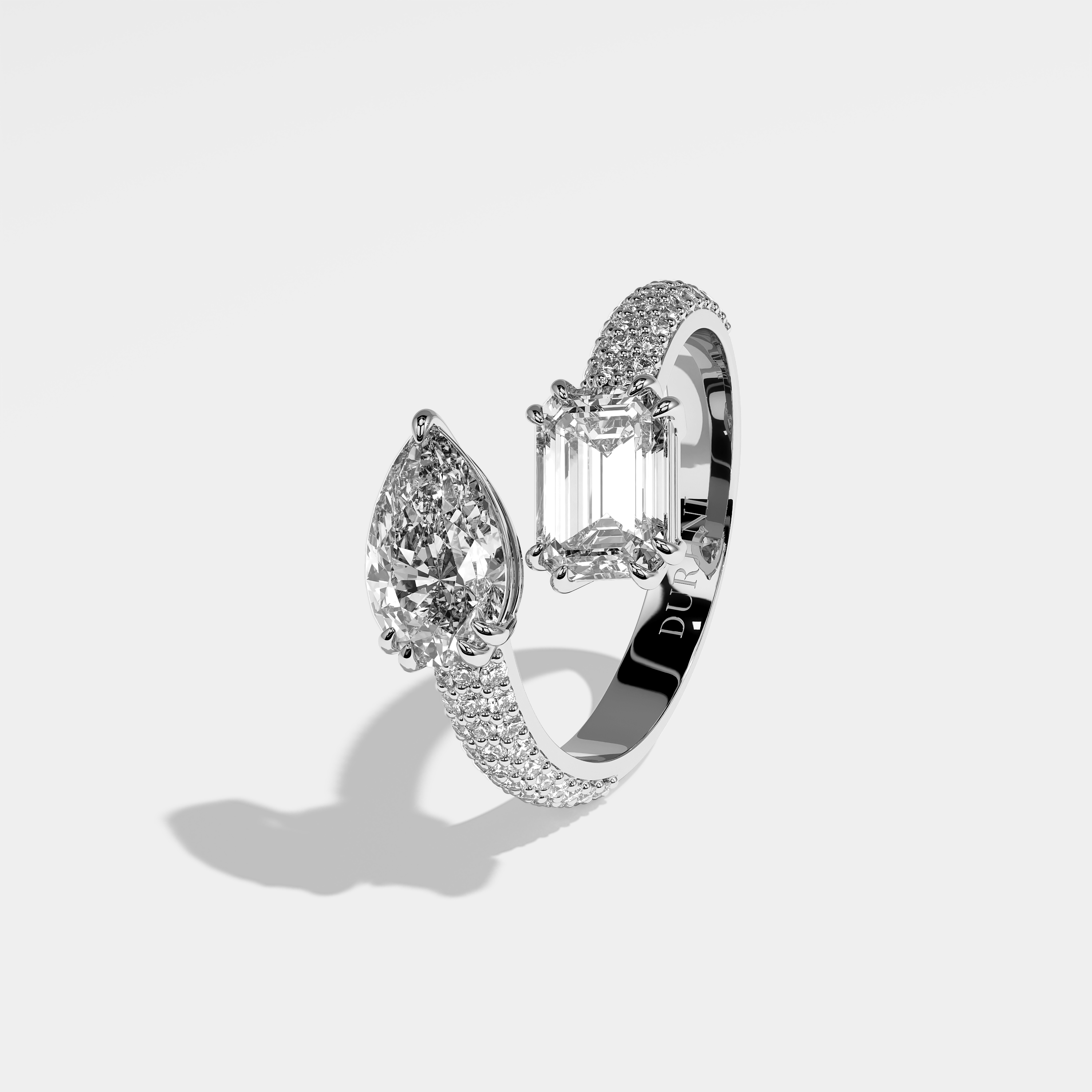 Heir pear diamond engagement ring in 18K white gold by Kurbãni Durjini, left view