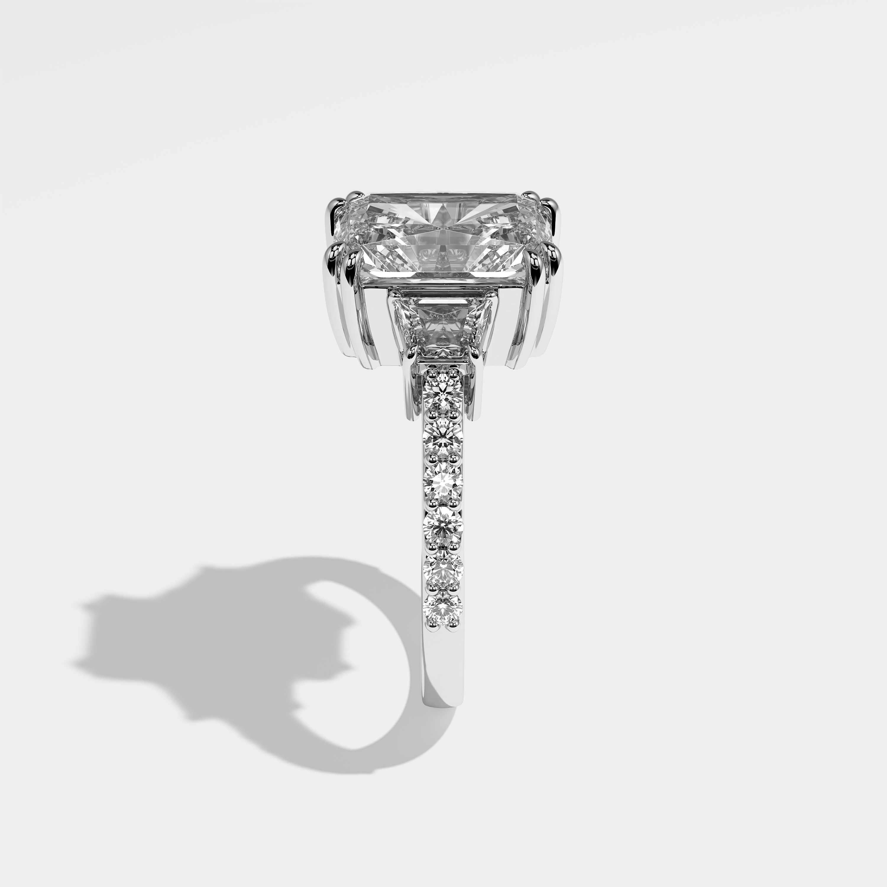 Aliza radiant halo diamond engagement ring in 18K white gold by Kurbãni Durjini, side view