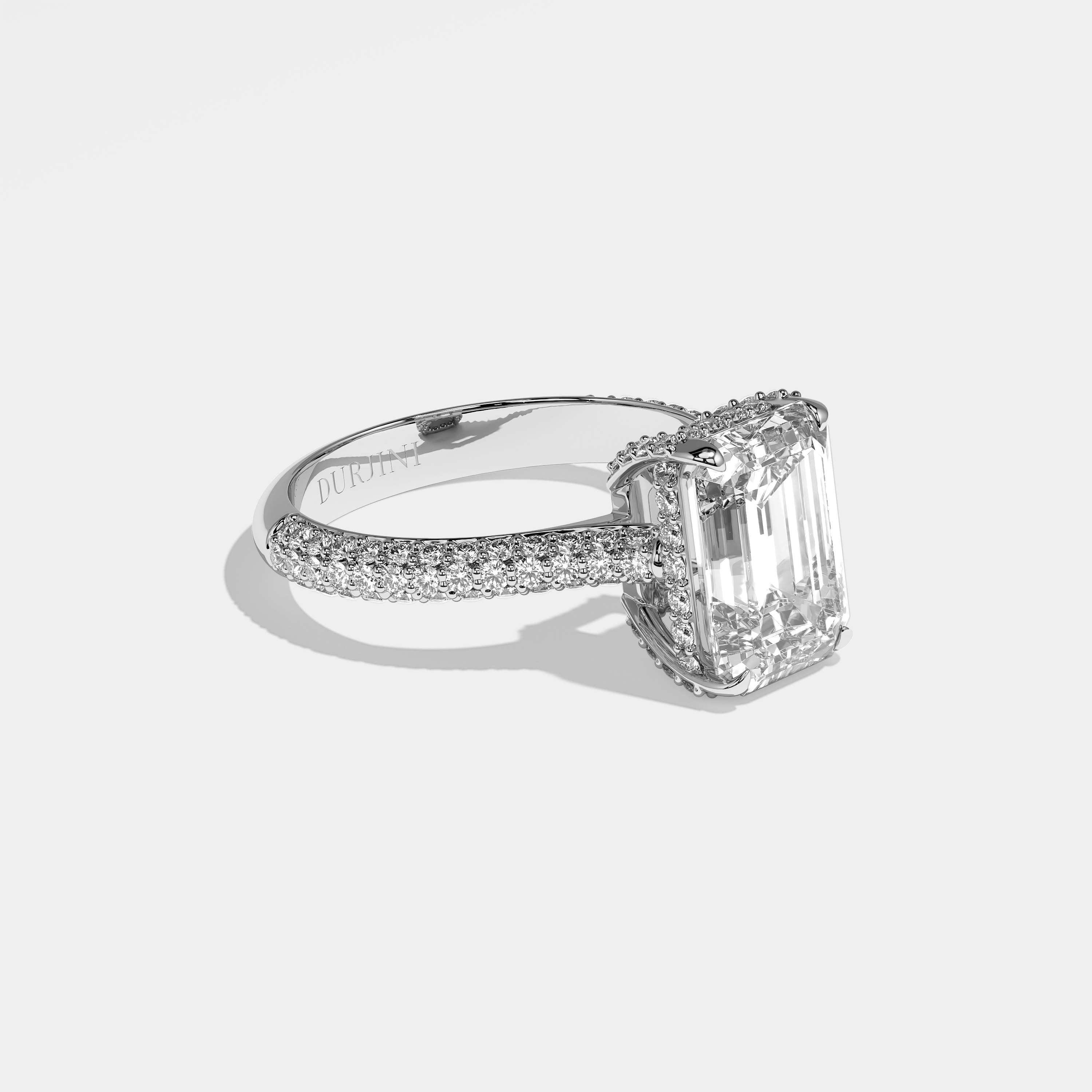 Jess emerald halo diamond engagement ring in 18K white gold by Kurbãni Durjini, right view