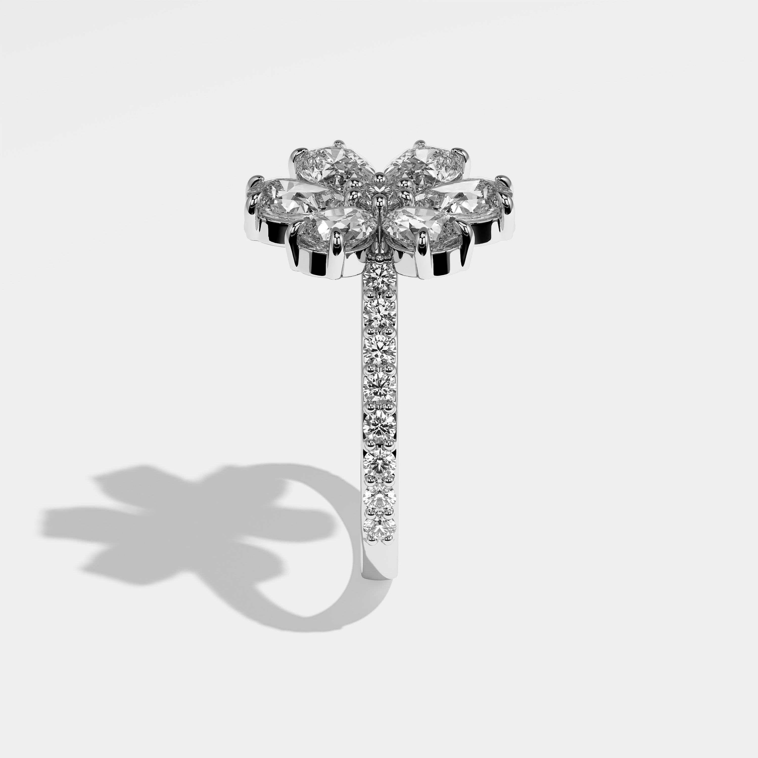 Justice pear diamond engagement ring in 18K white gold by Kurbãni Durjini, side view