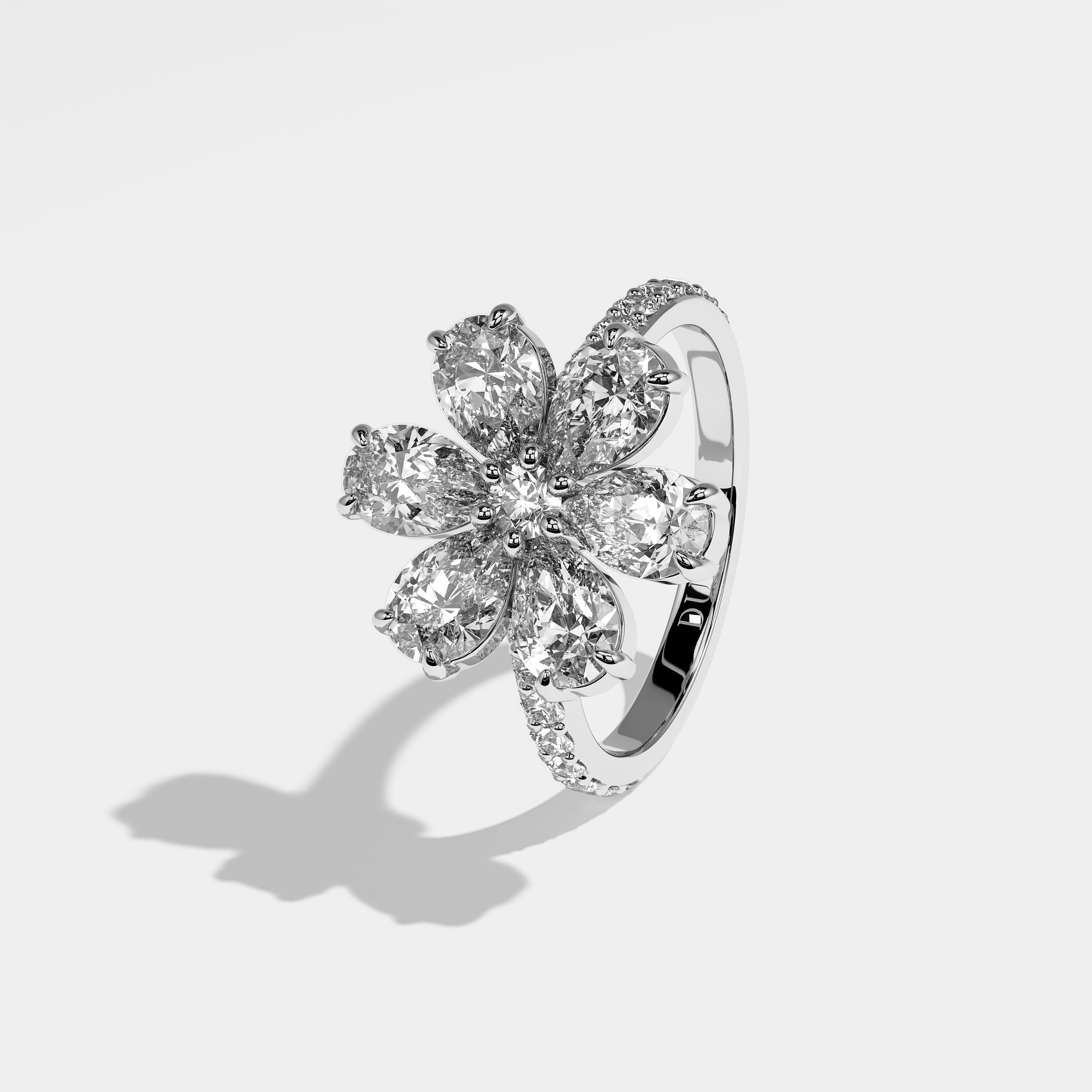 Justice pear diamond engagement ring in 18K white gold by Kurbãni Durjini, left view