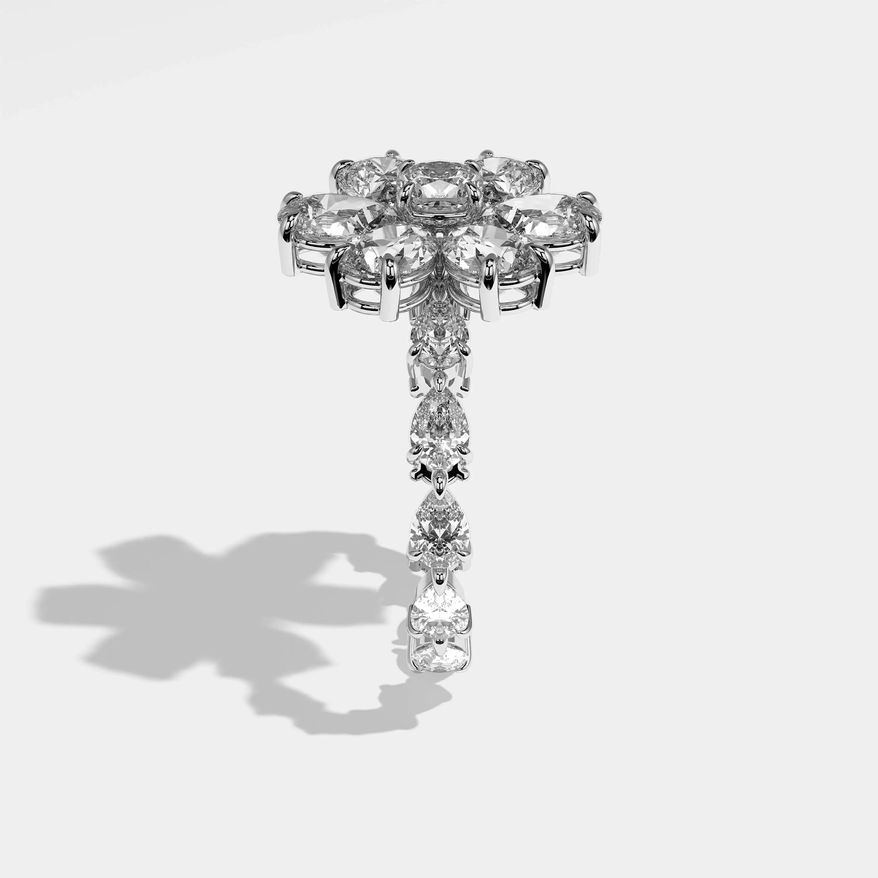 Harmony pear flower halo diamond engagement ring in 18K white gold by Kurbãni Durjini, side view