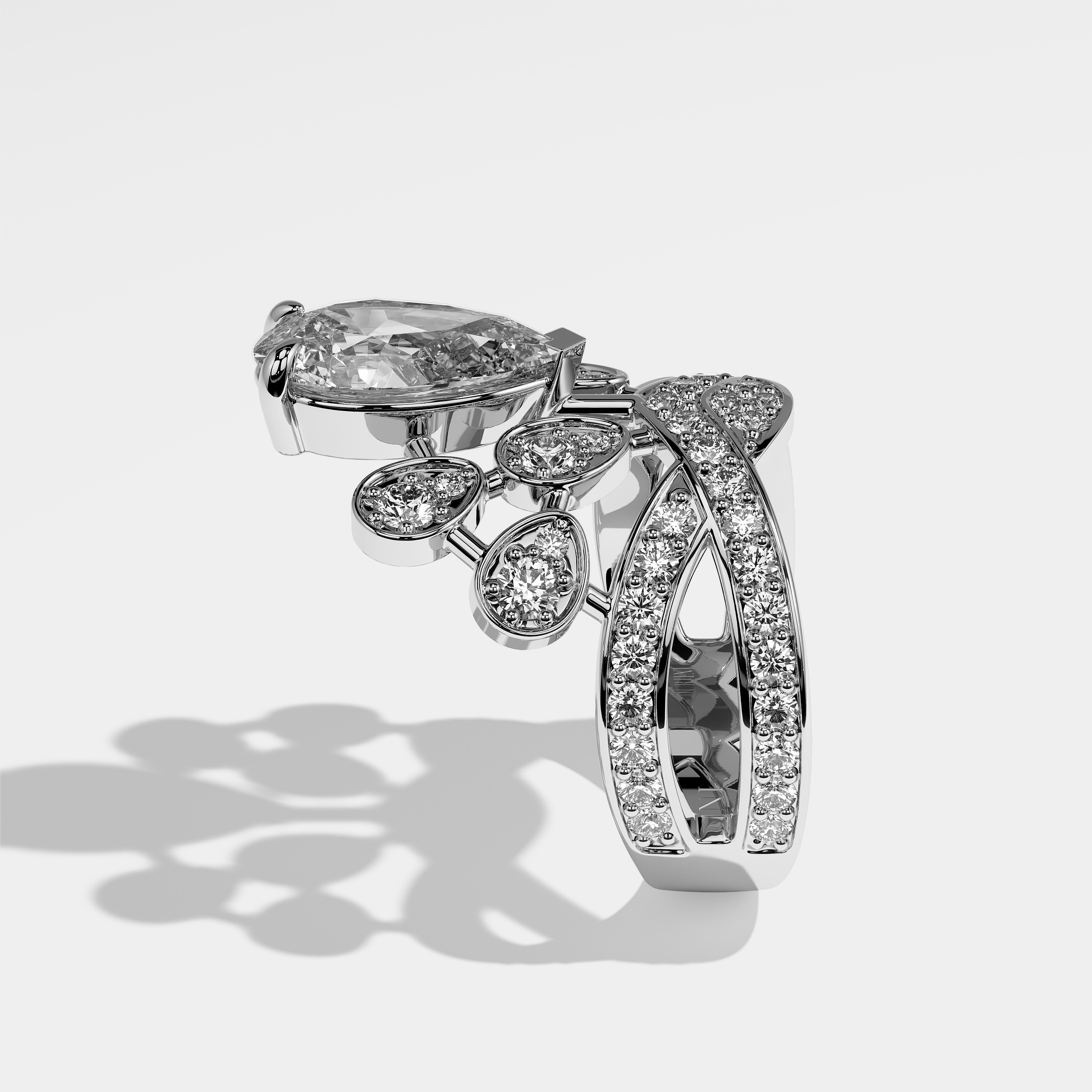 Velar pear diamond engagement ring in 18K white gold by Kurbãni Durjini, side view