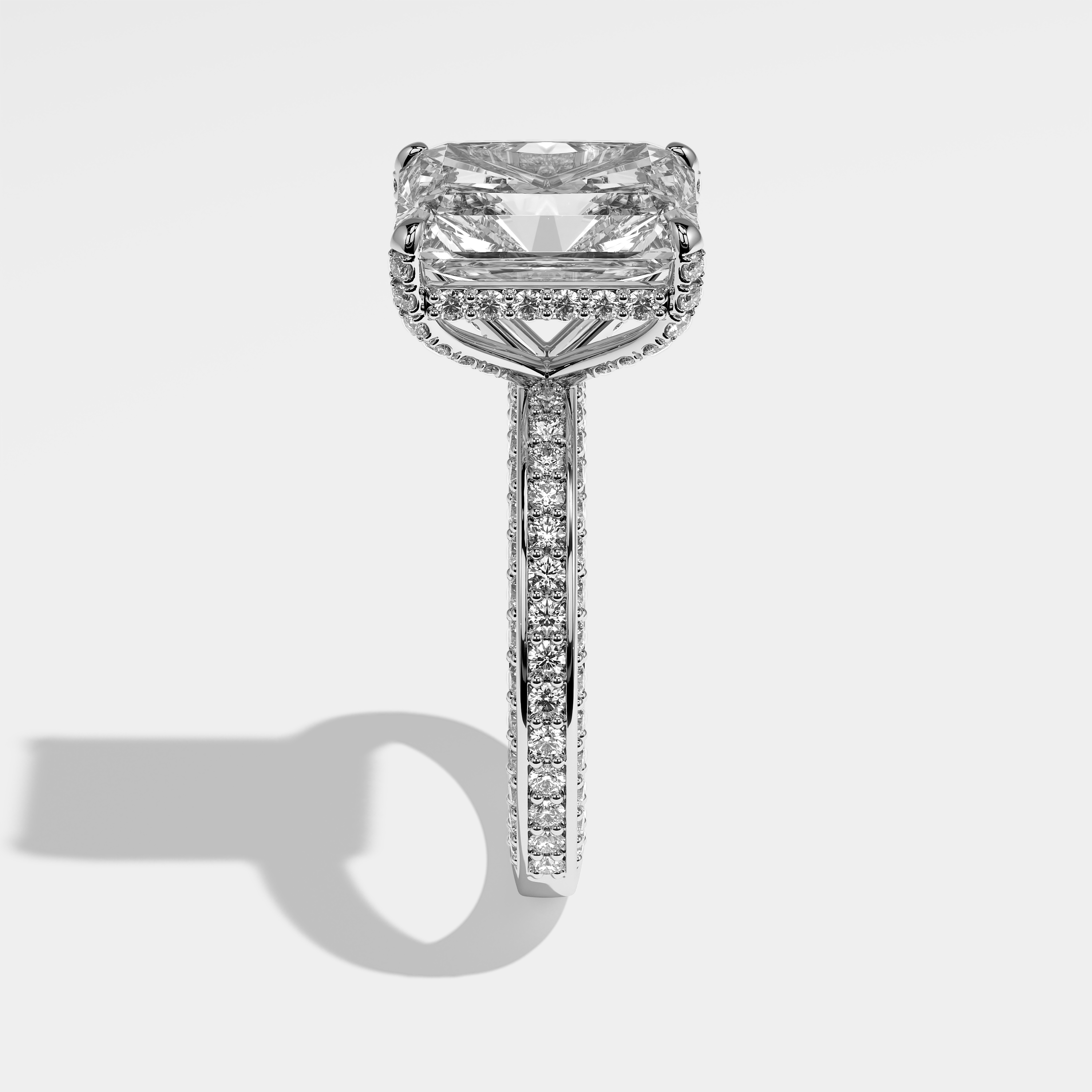 Philippa radiant halo diamond engagement ring in 18K white gold by Kurbãni Durjini, side view