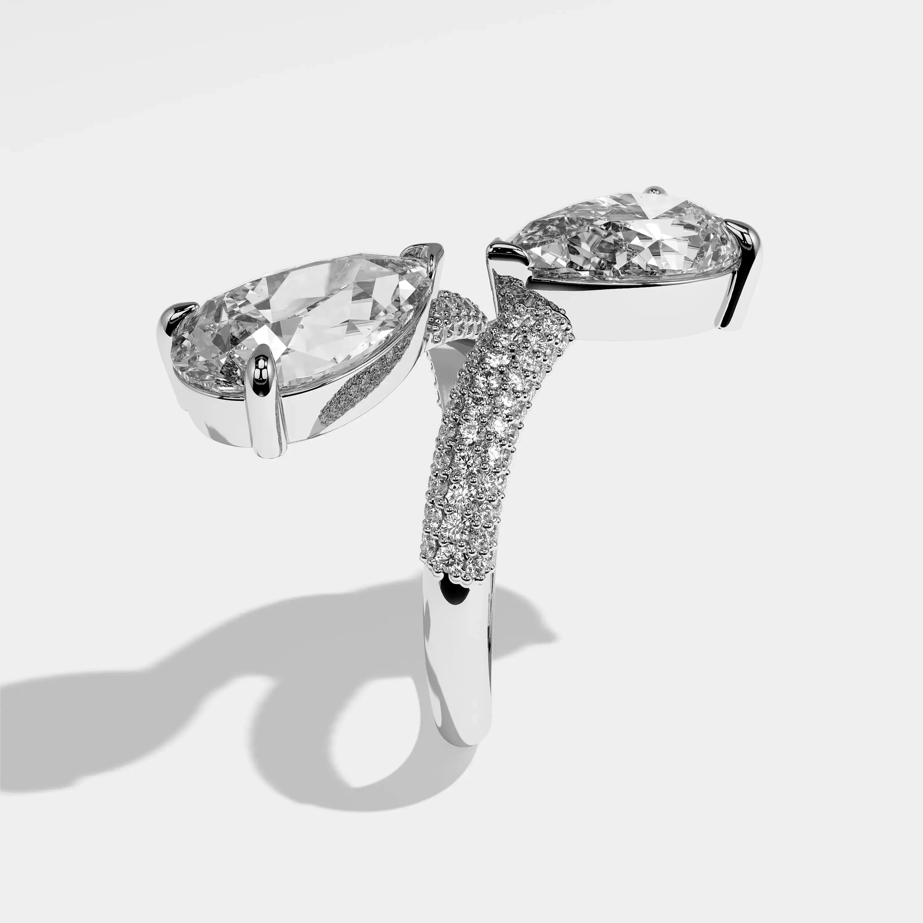 Evangeline pear diamond engagement ring in 18K white gold by Kurbãni Durjini, side view