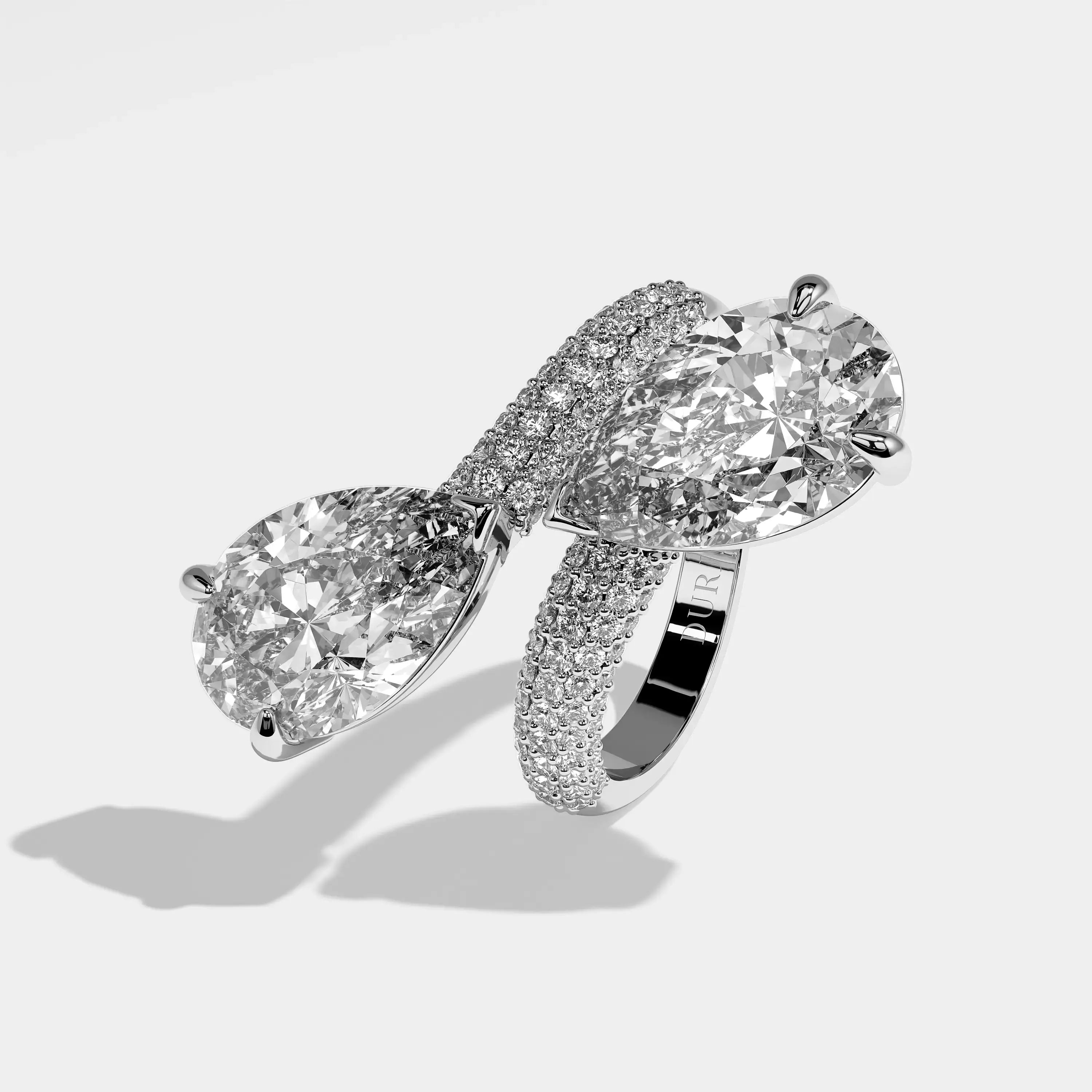 Evangeline pear diamond engagement ring in 18K white gold by Kurbãni Durjini, left view