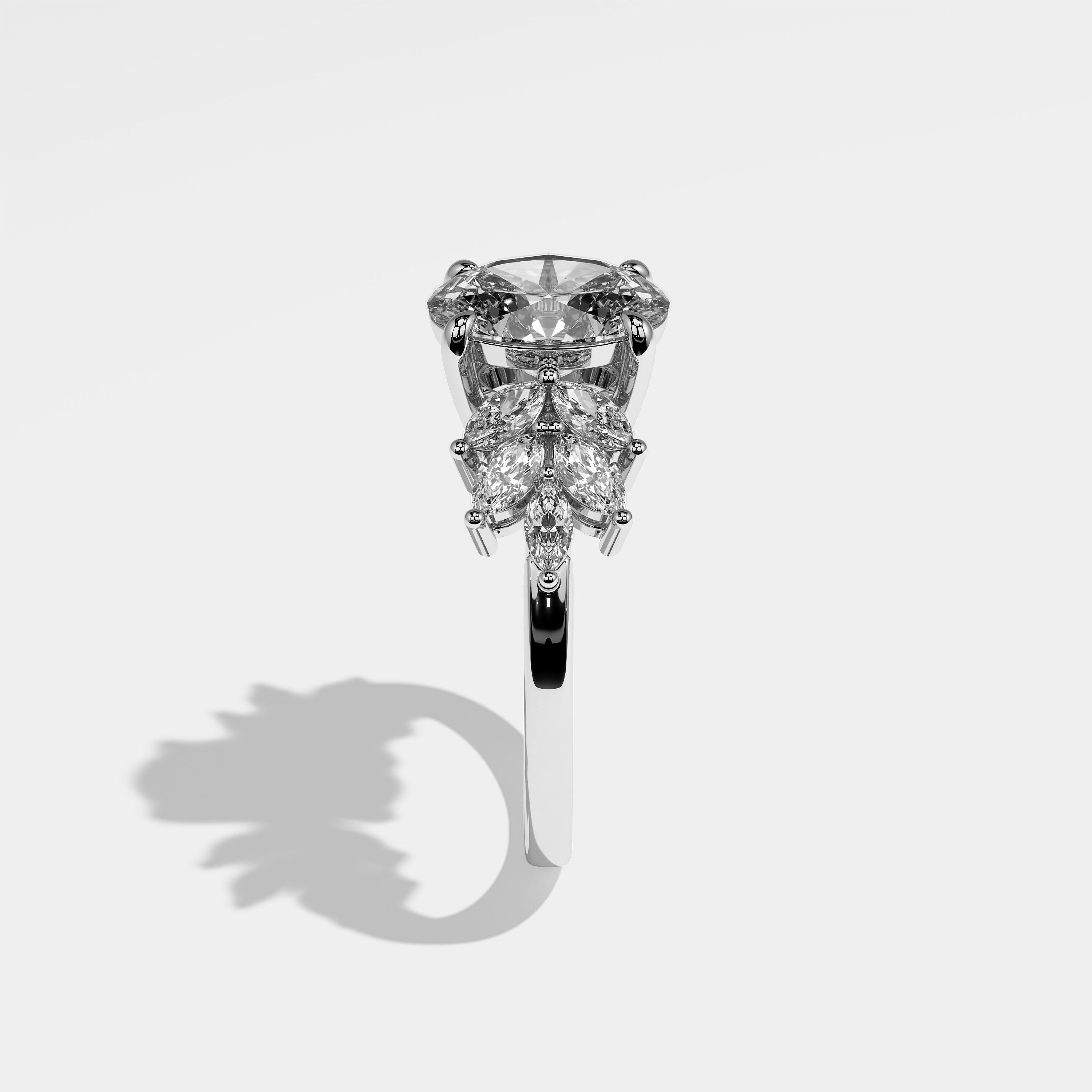 Thalia oval diamond engagement ring in 18K white gold by Kurbãni Durjini, side view