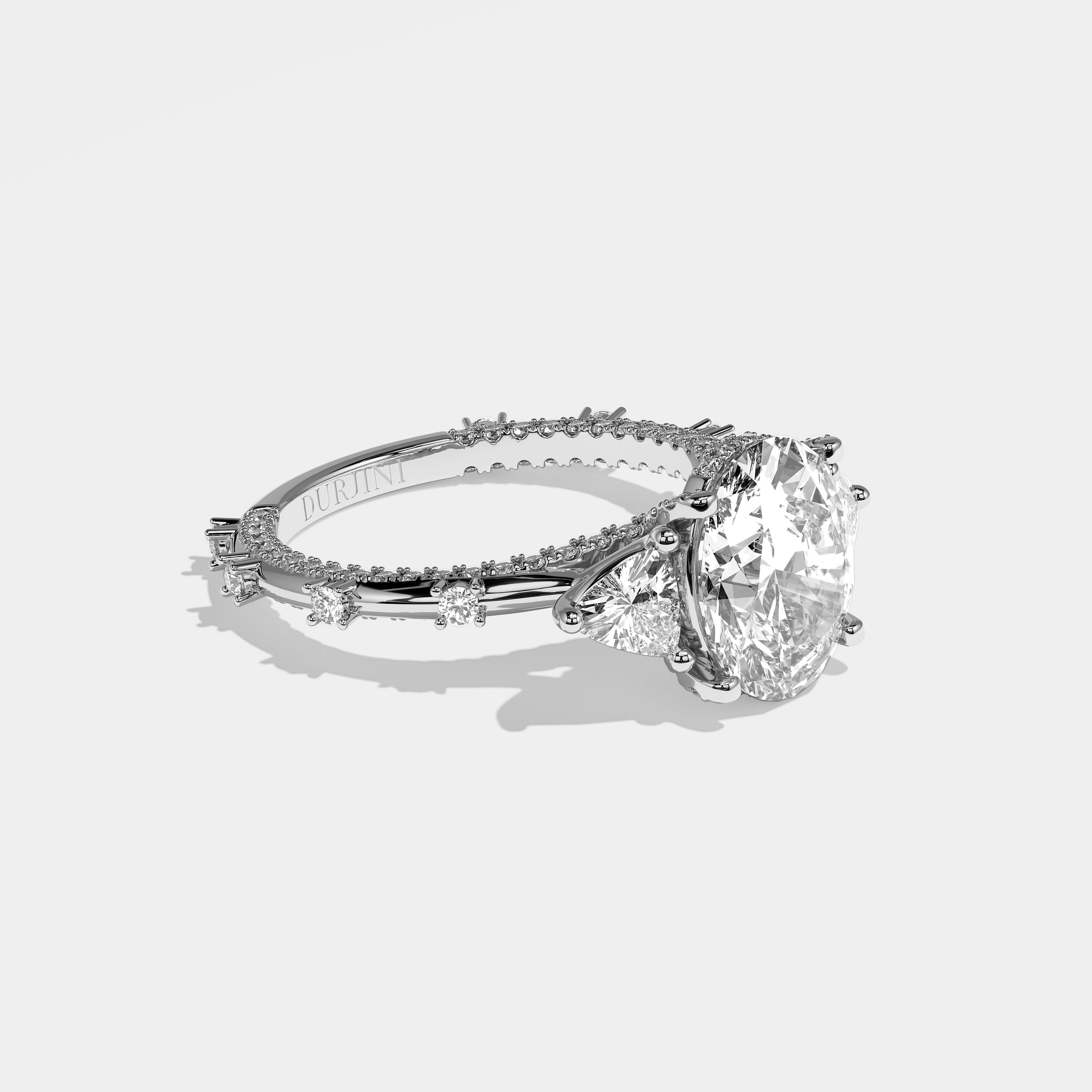 Arwen oval halo diamond engagement ring in 18K white gold by Kurbãni Durjini, right view
