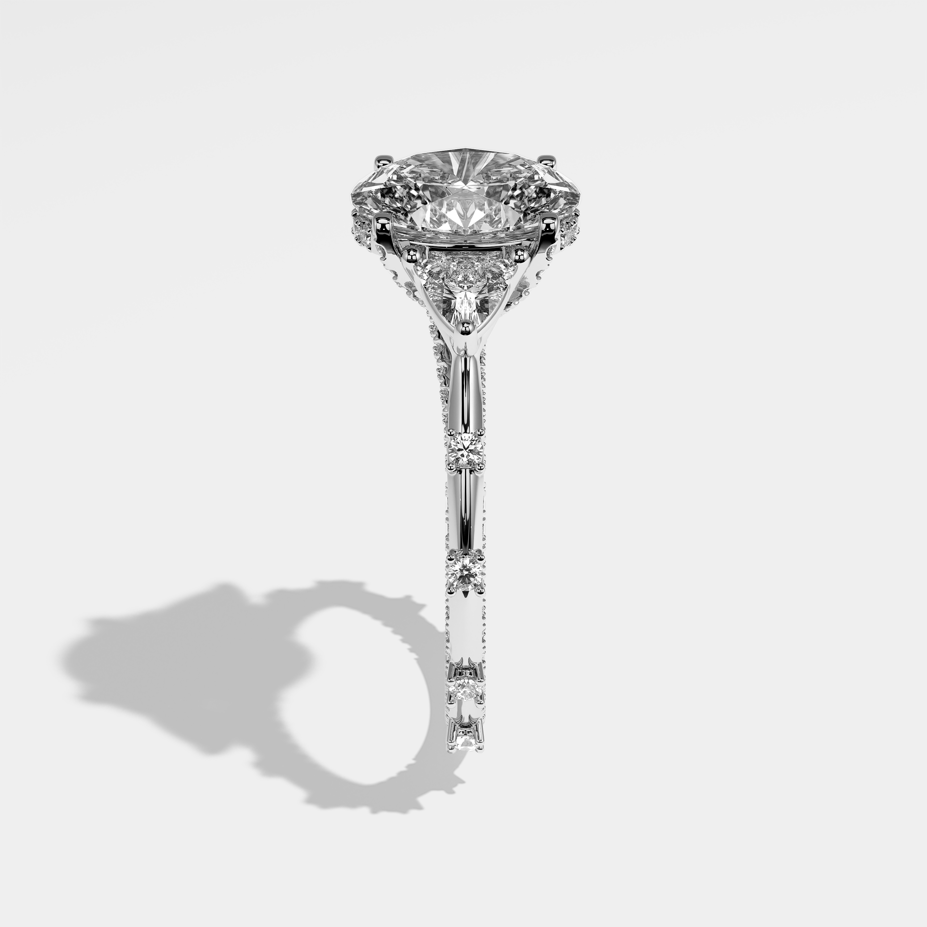 Arwen oval halo diamond engagement ring in 18K white gold by Kurbãni Durjini, side view